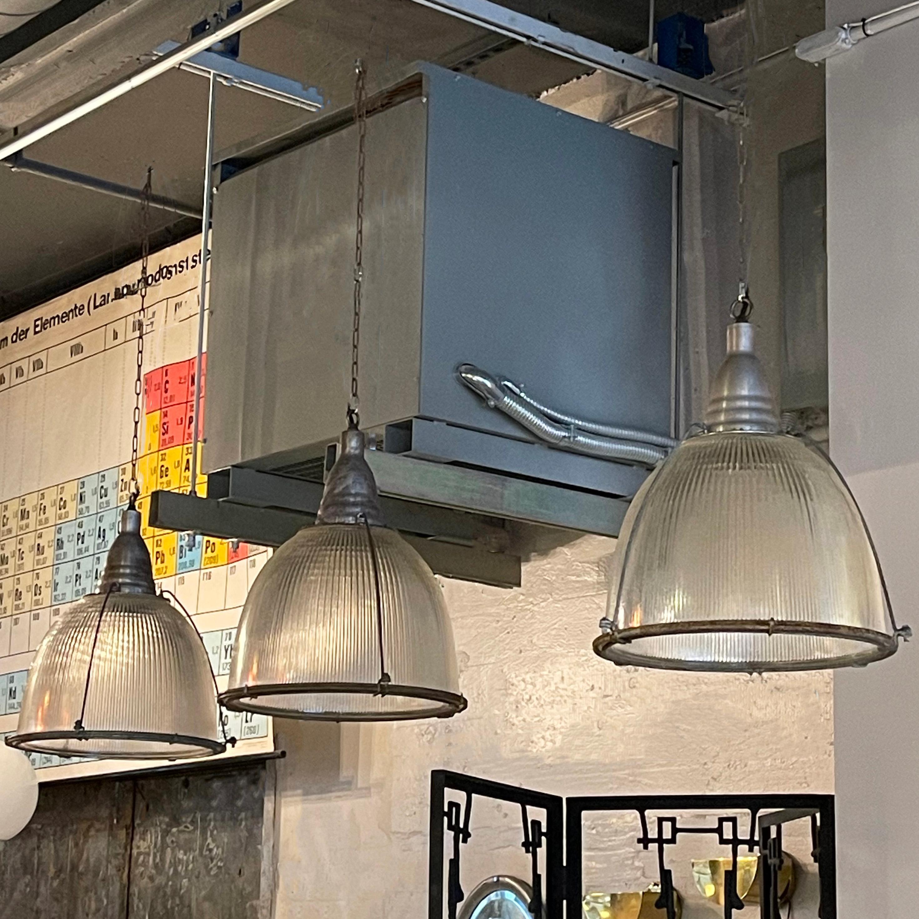 Industrial Factory Caged Holophane Glass Pendant Lights im Zustand „Gut“ im Angebot in Brooklyn, NY