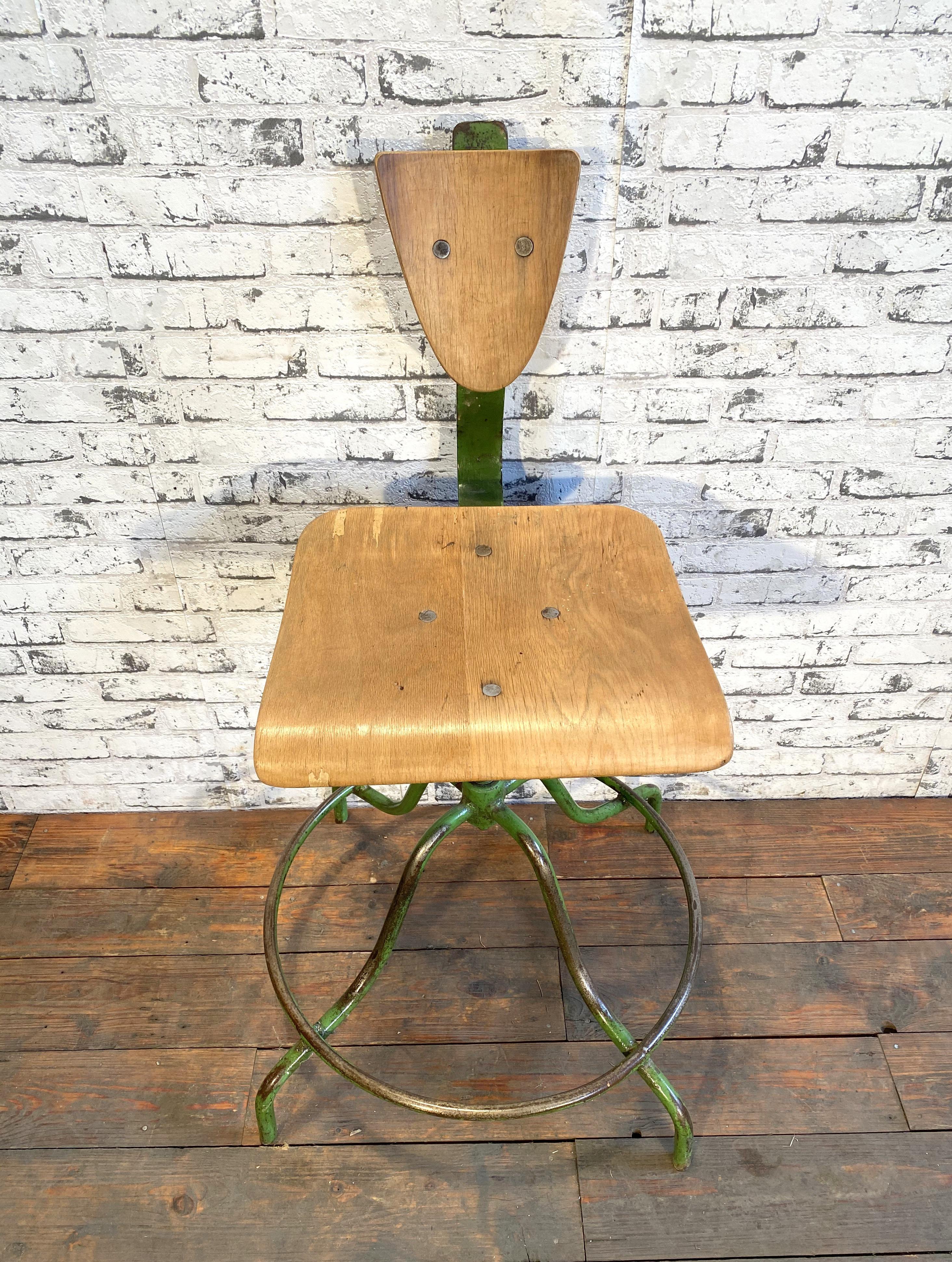 This industrial chair was made in former Czechoslovakia during the 1960s. The construction is made of green painted iron and has a plywood seat and backrest. The chair is in very good vintage condition. Weight of the chair is 8 kg.
Additional