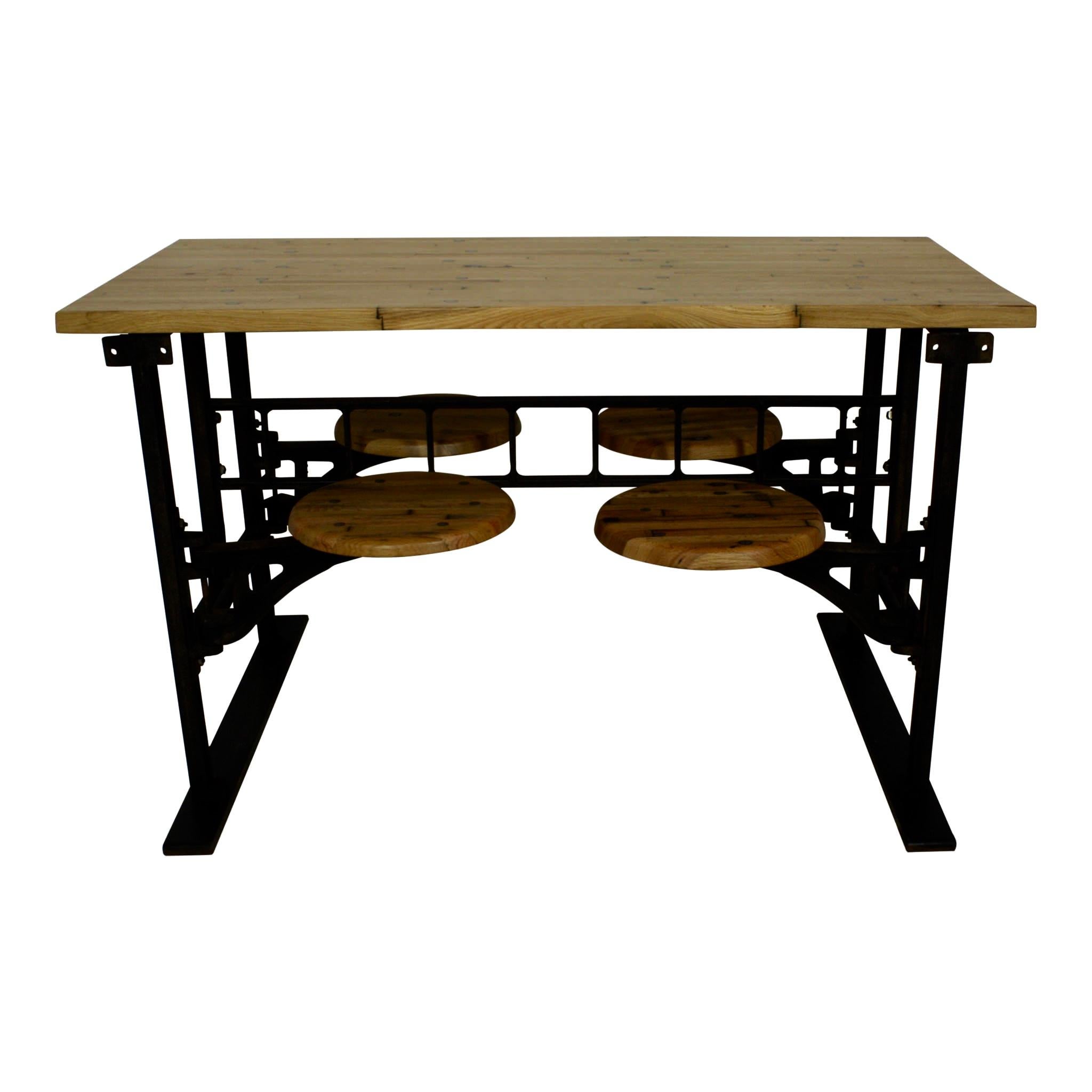 This industrial table with seating features a reclaimed butcher block top, maple seats, and a cast iron frame. Large screws were used to secure the wood to the frame and complete the Industrial look. The set was designed as a replica of factory and