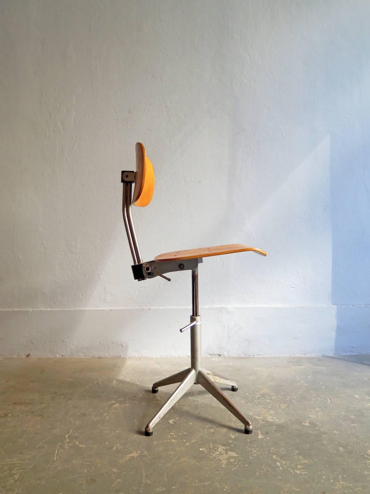 Industrial finish adjustable and swivel office chair.