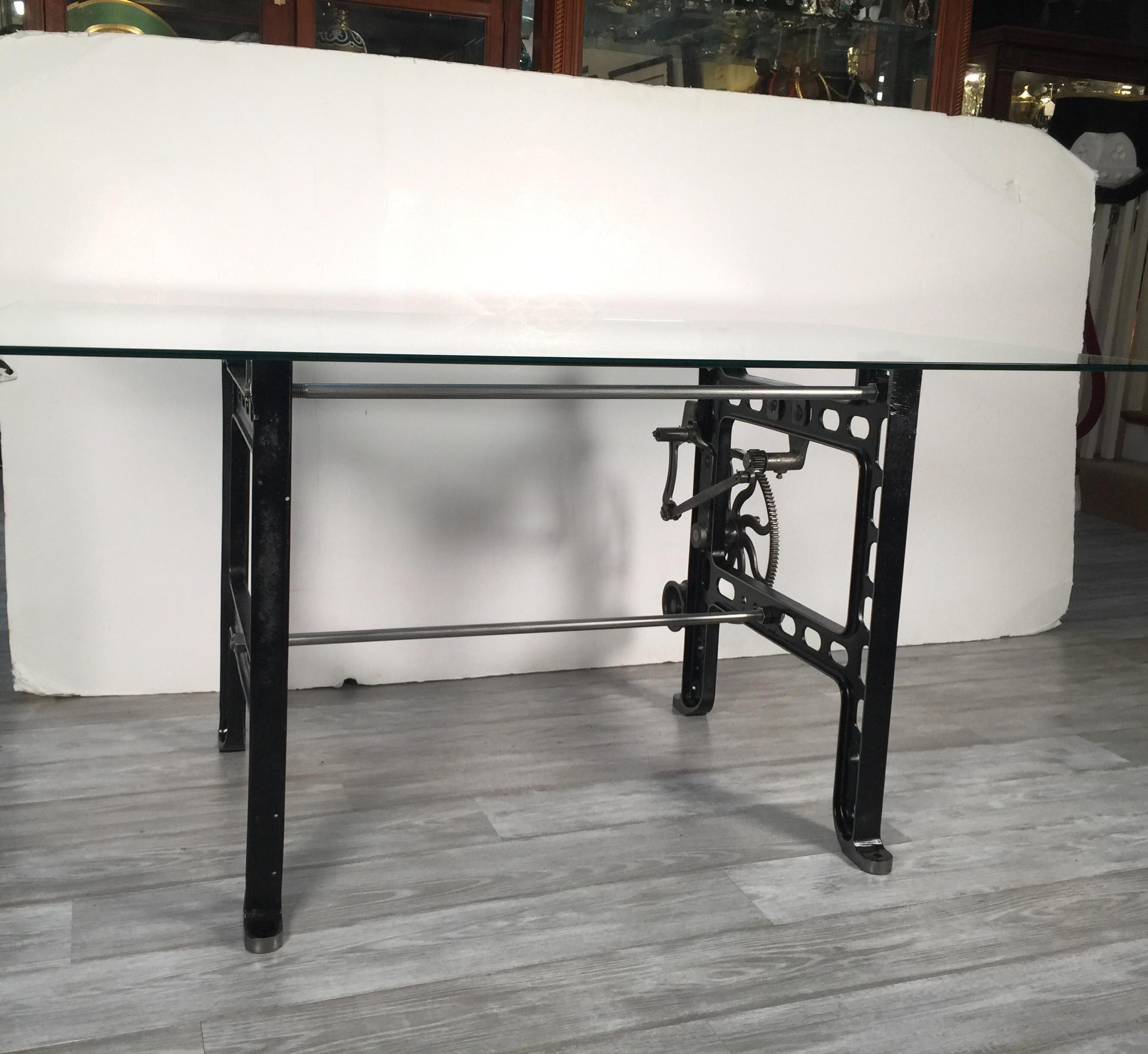 Original factory table base with gears has been restored to an outstanding desk or table. New glass tabletop is 60