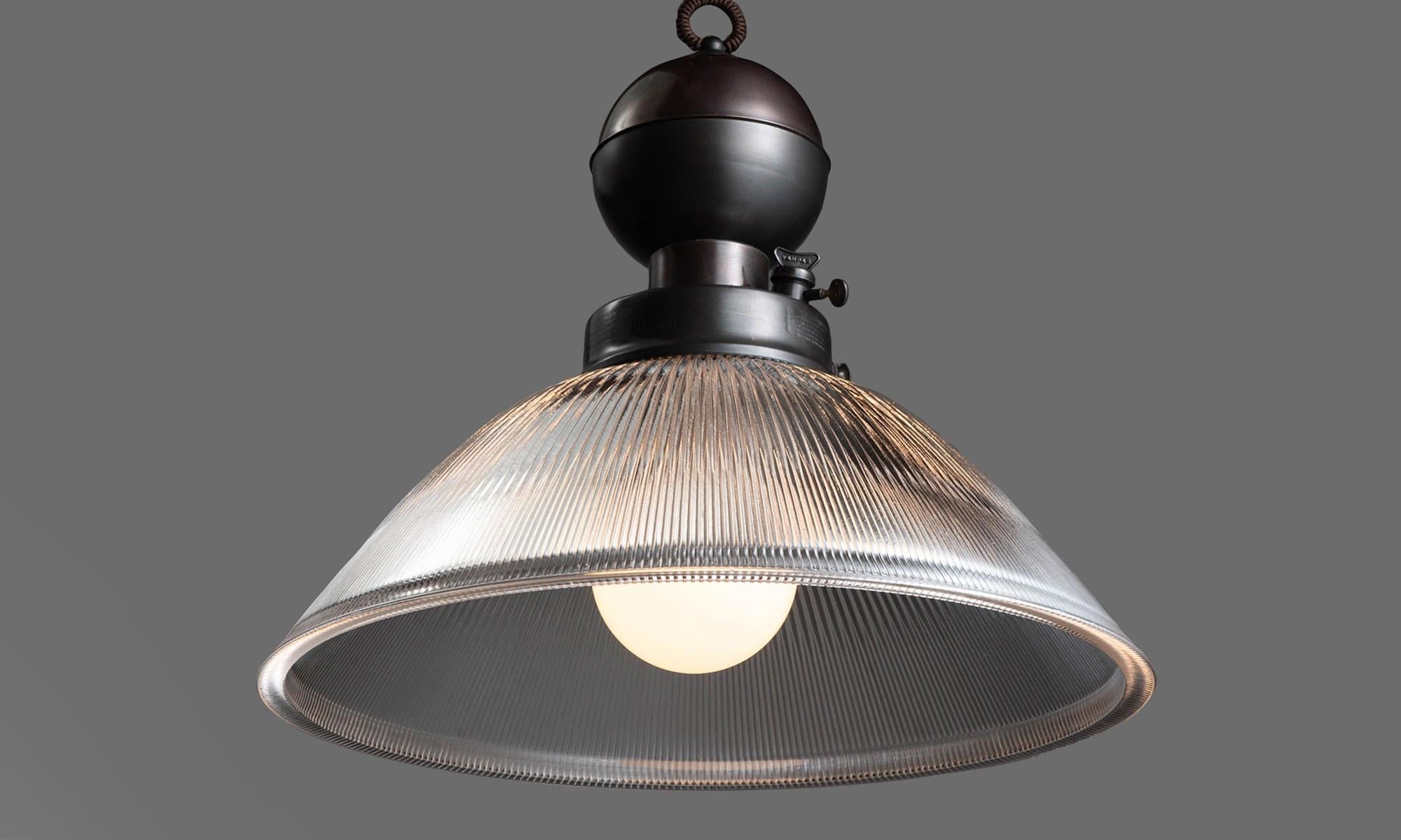 Industrial glass and brass gas lamp pendant, Italy, 21st century.

In the style of an Industrial gas lamp pendant, converted to electric.

*Please Note: This fixture is made in Italy, and comes newly wired (eu wiring). It is not UL Listed. Standard