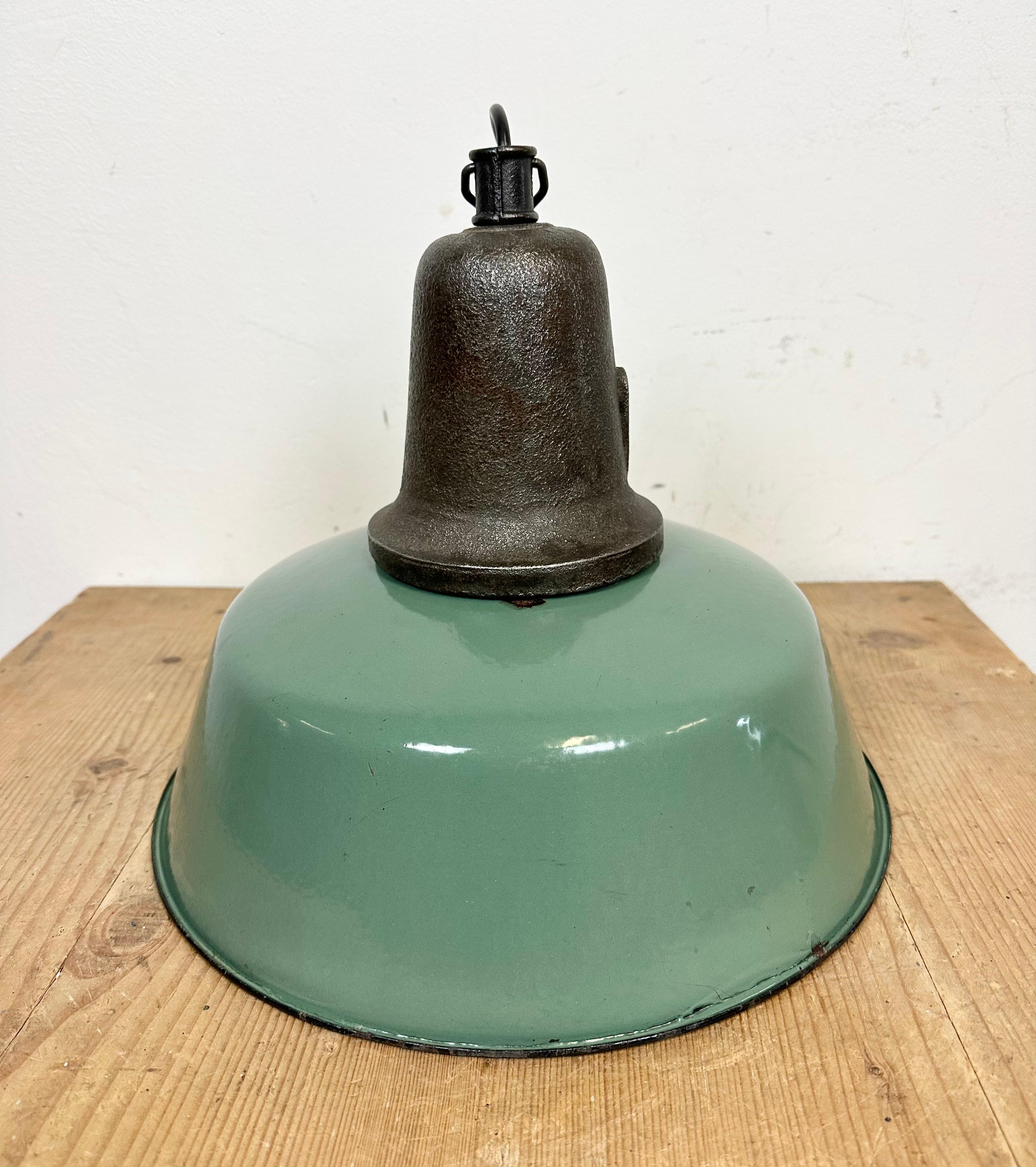 Polish Industrial Green Enamel Factory Lamp with Cast Iron Top, 1960s For Sale