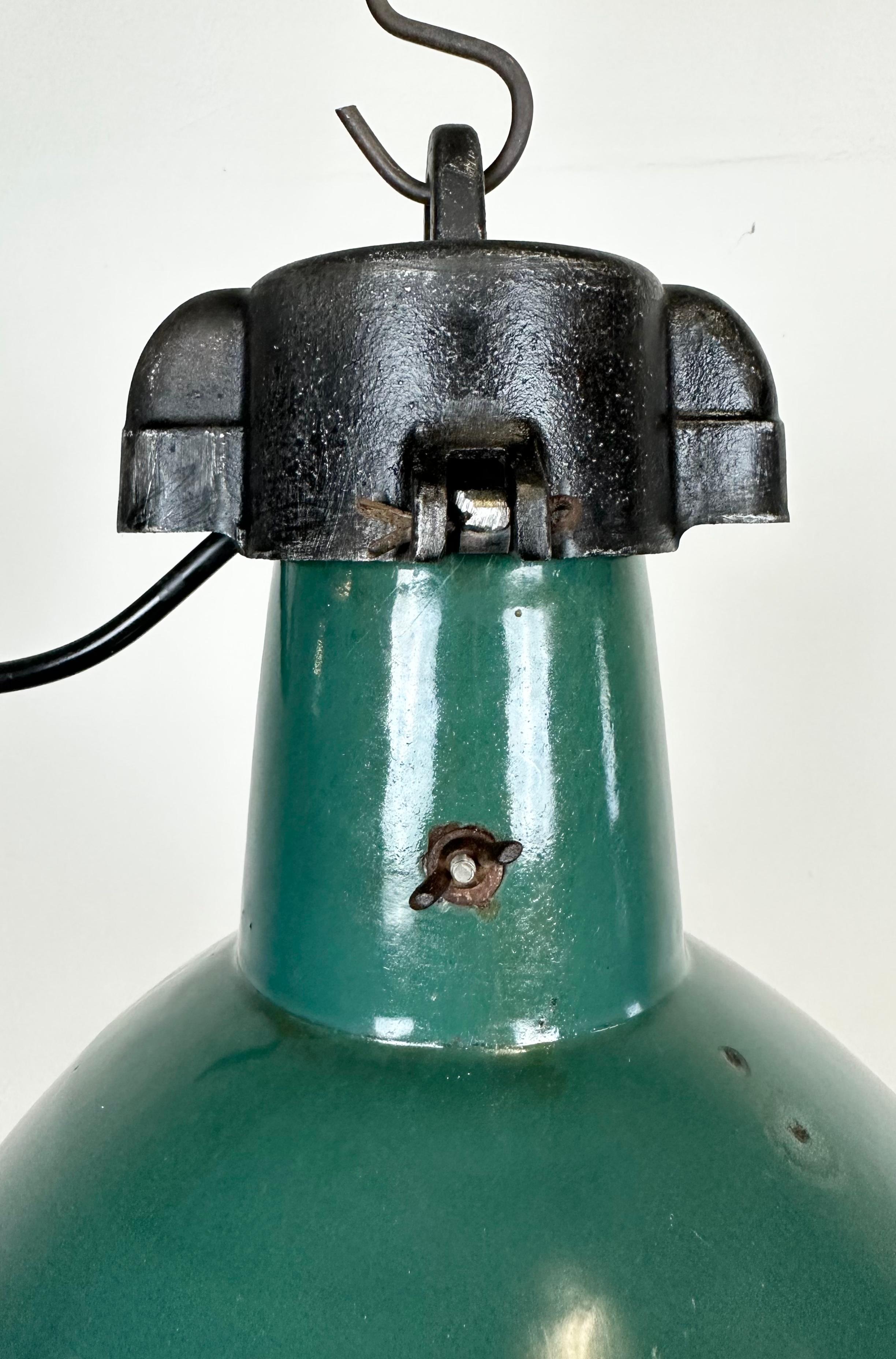 Industrial Green Enamel Factory Lamp with Cast Iron Top, 1960s In Fair Condition In Kojetice, CZ