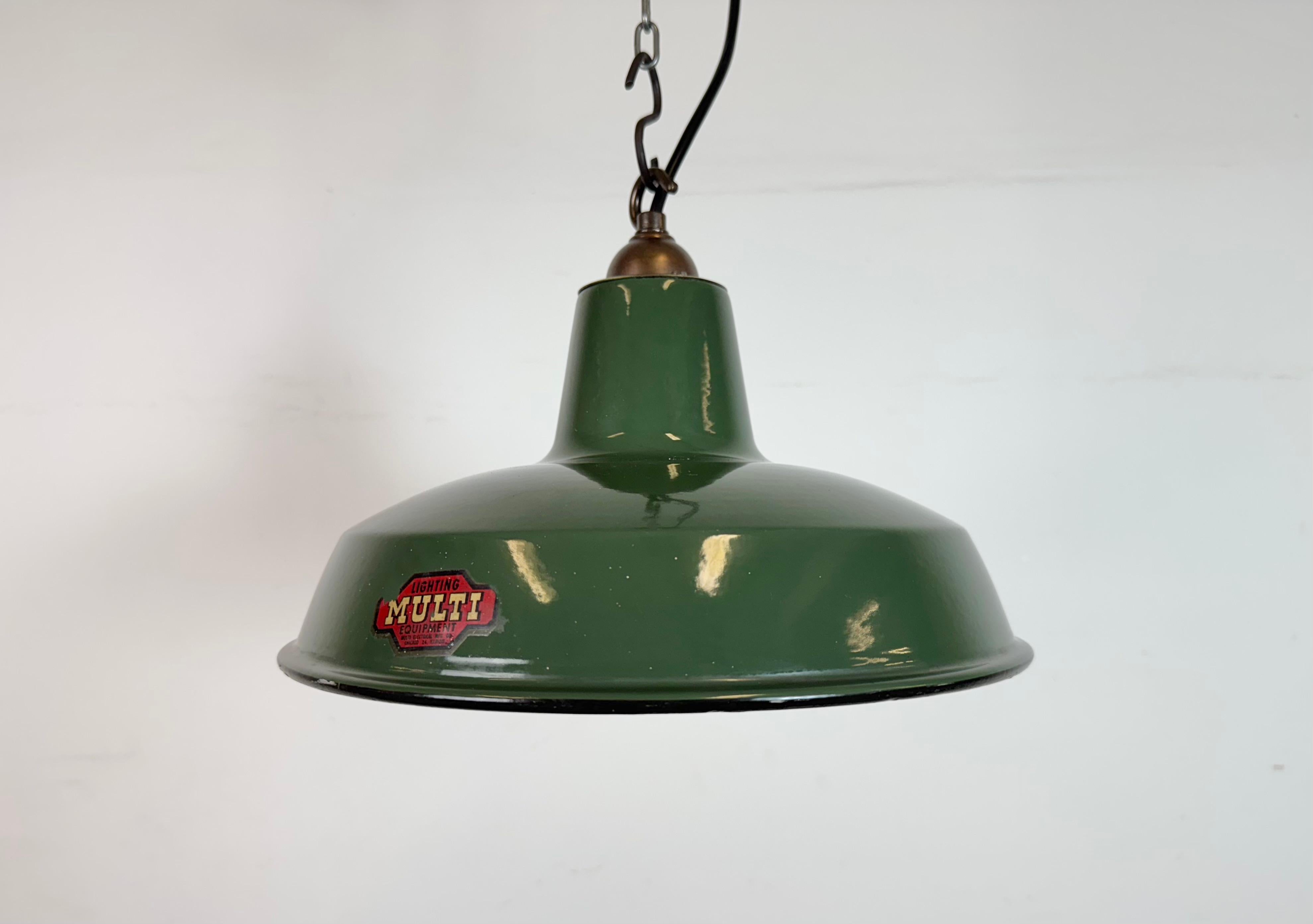 Industrial green enamel factory pendant light made by Multi Electric Co. Chicago, Illinois in United States during the 1960s. White enamel inside the shade. Brass top. The socket requires standard E27/E26 light bulbs. New wire. The weight of the