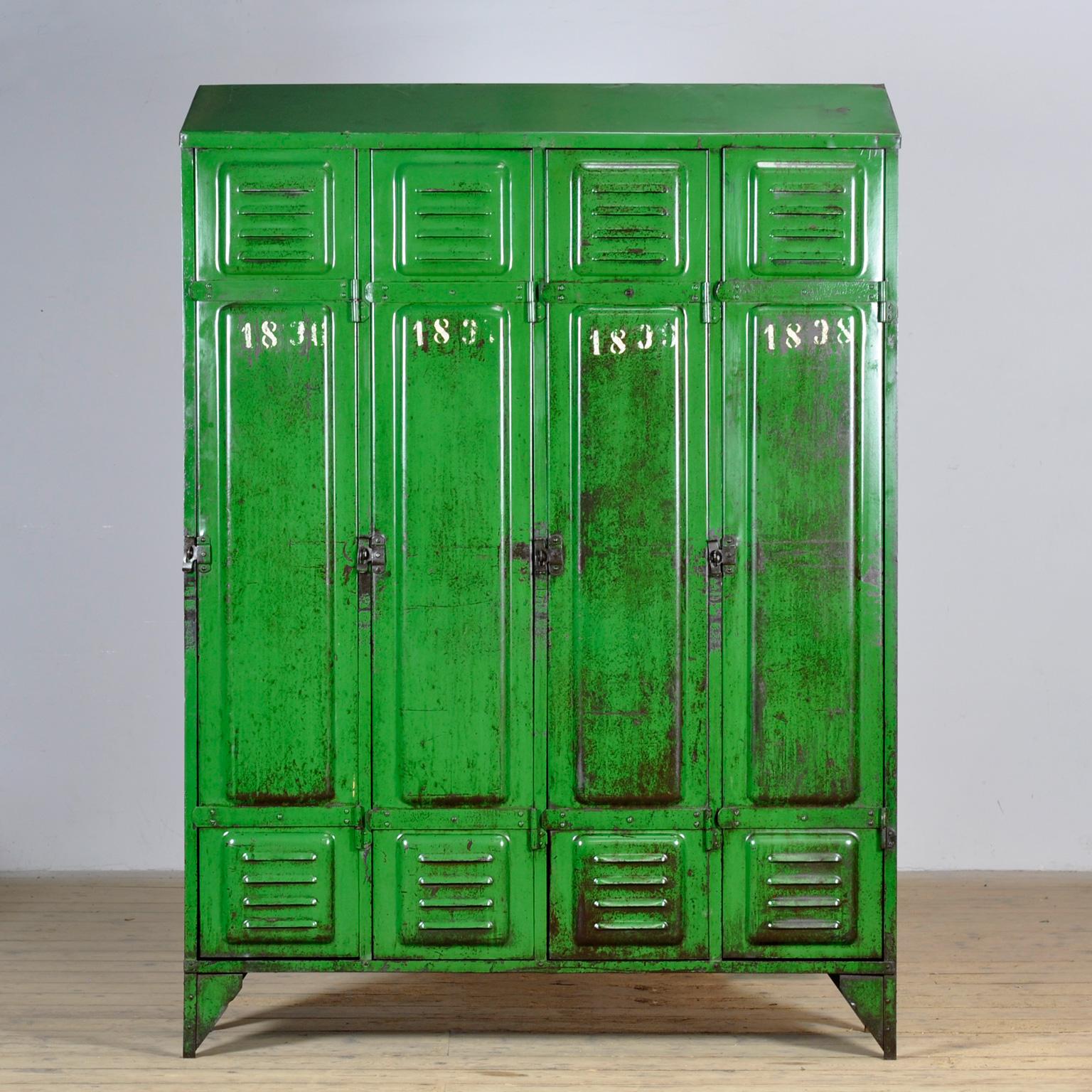 This locker was made in France around 1950 and has four compartments to store all your belongings. In the upper part a shelf and in the lower part clothes hooks. The locker has a green color that fits with any style. The locker has a rustic and