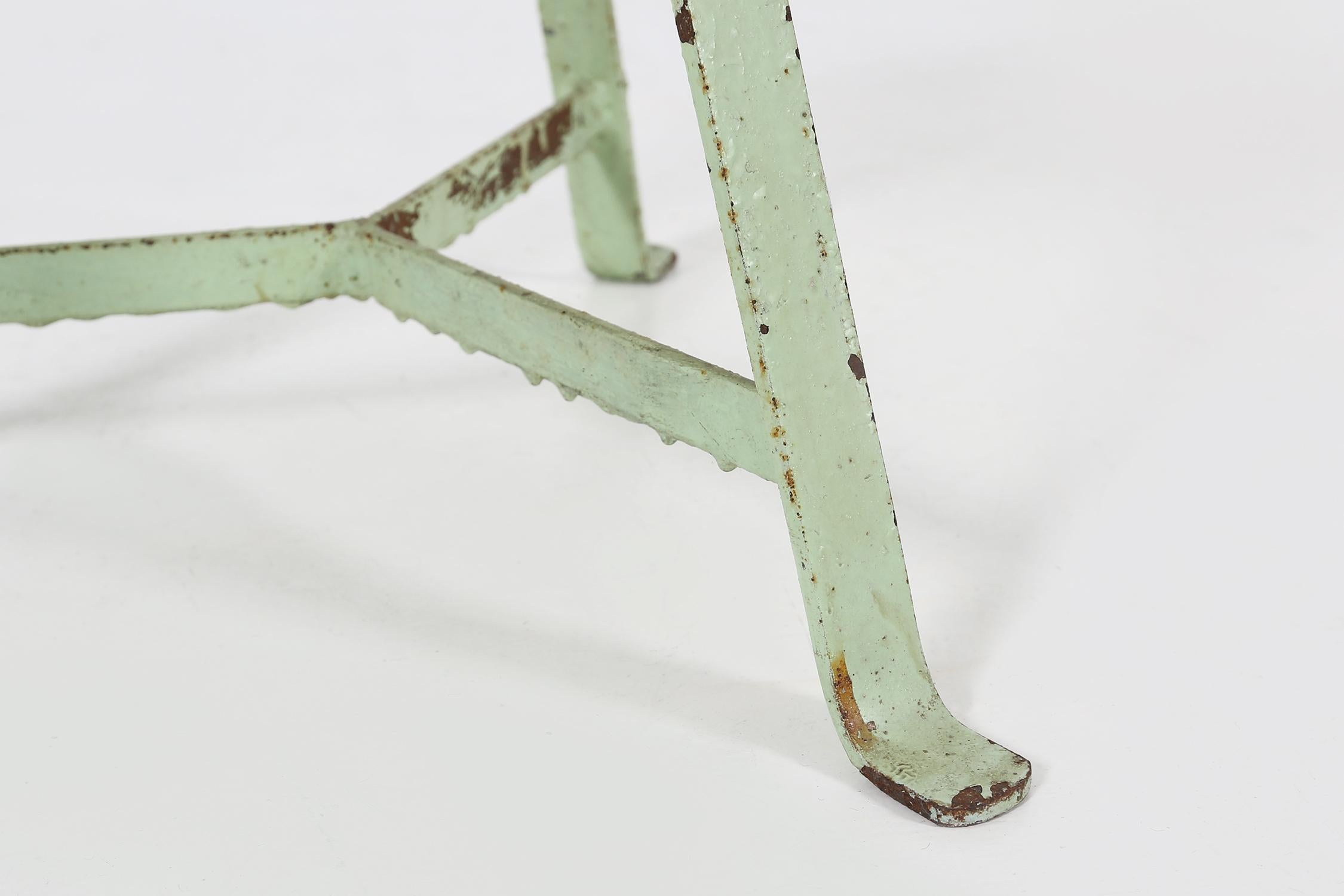 Mid-20th Century Industrial green painted stool with steel base and wooden top, France 1930s For Sale