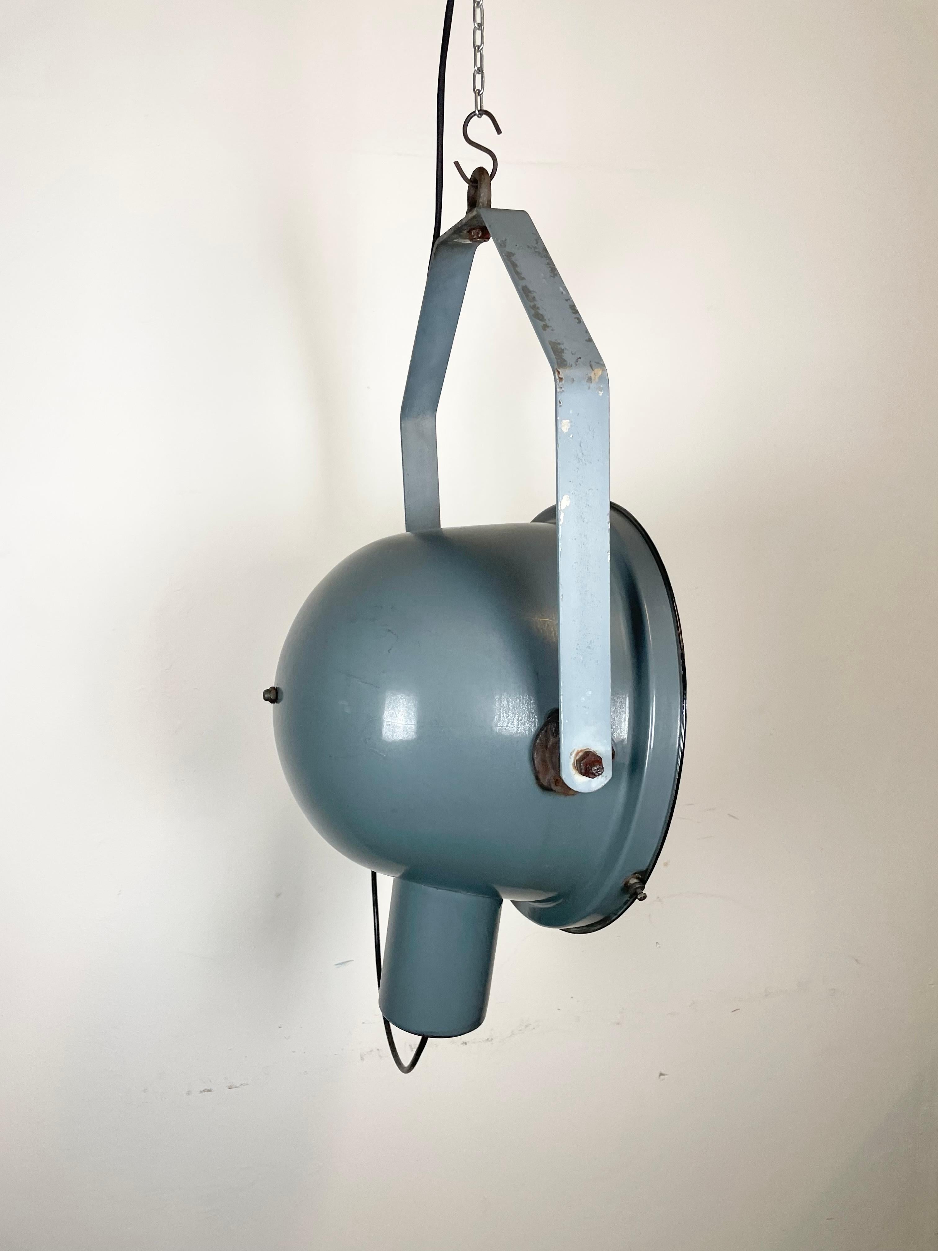 - Vintage factory spotlight made in former Czechoslovakia during the 1960s 
- It features a grey enamel body with white enamel interior and clear glass cover
- The porcelain socket requires E27/ E26 lightbulbs 
- New wire
-The height of the
