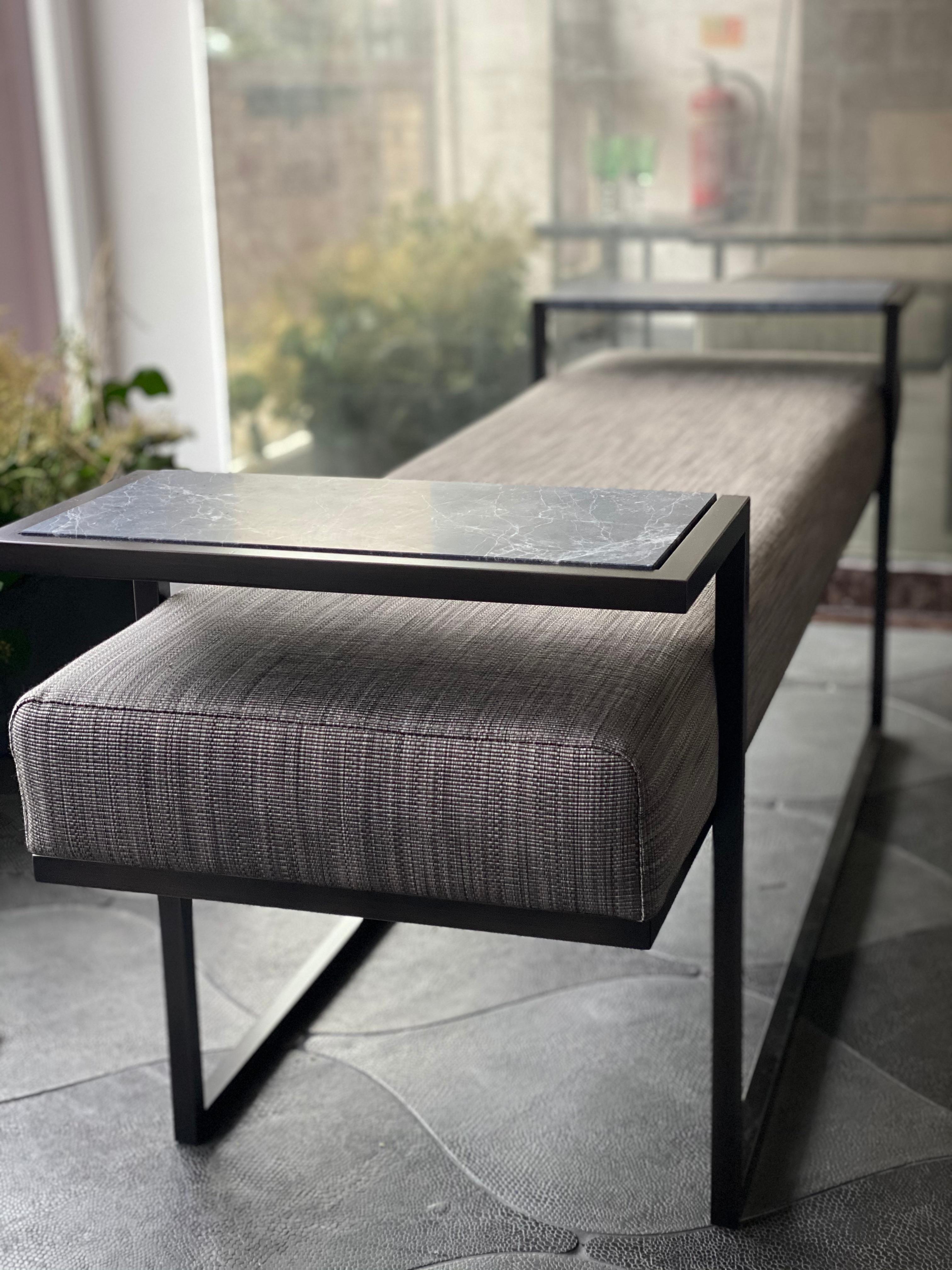 Named after the Greek god of sexual attraction, the Eros bench will visually seduce with its architectural lines and demanding presence. Made from blackened steel and upholstered in one of Casa Botelho’s luxe fabrics, the Eros bench is an ideal