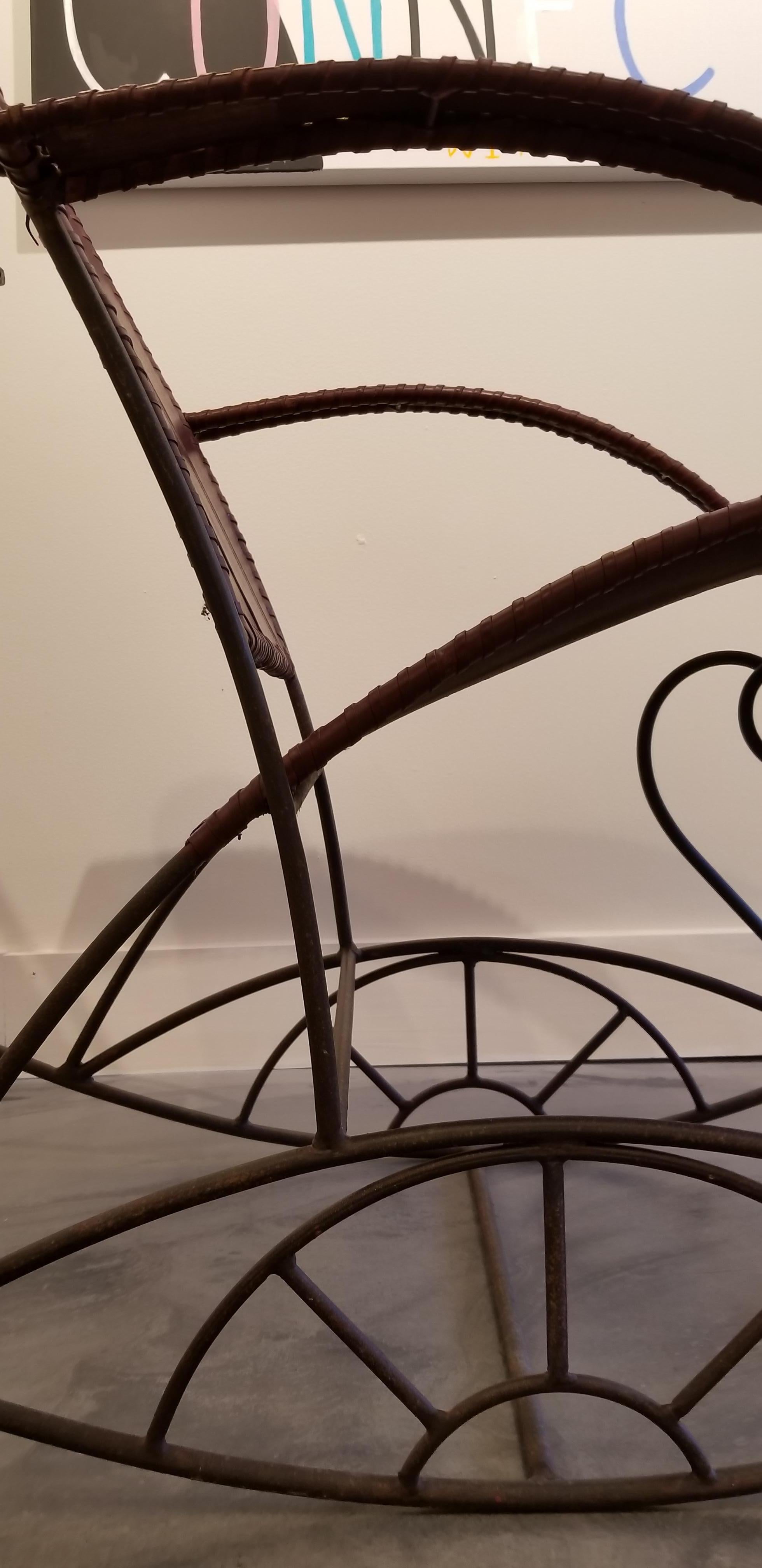 20th Century Industrial Iron and Leather Rocker For Sale