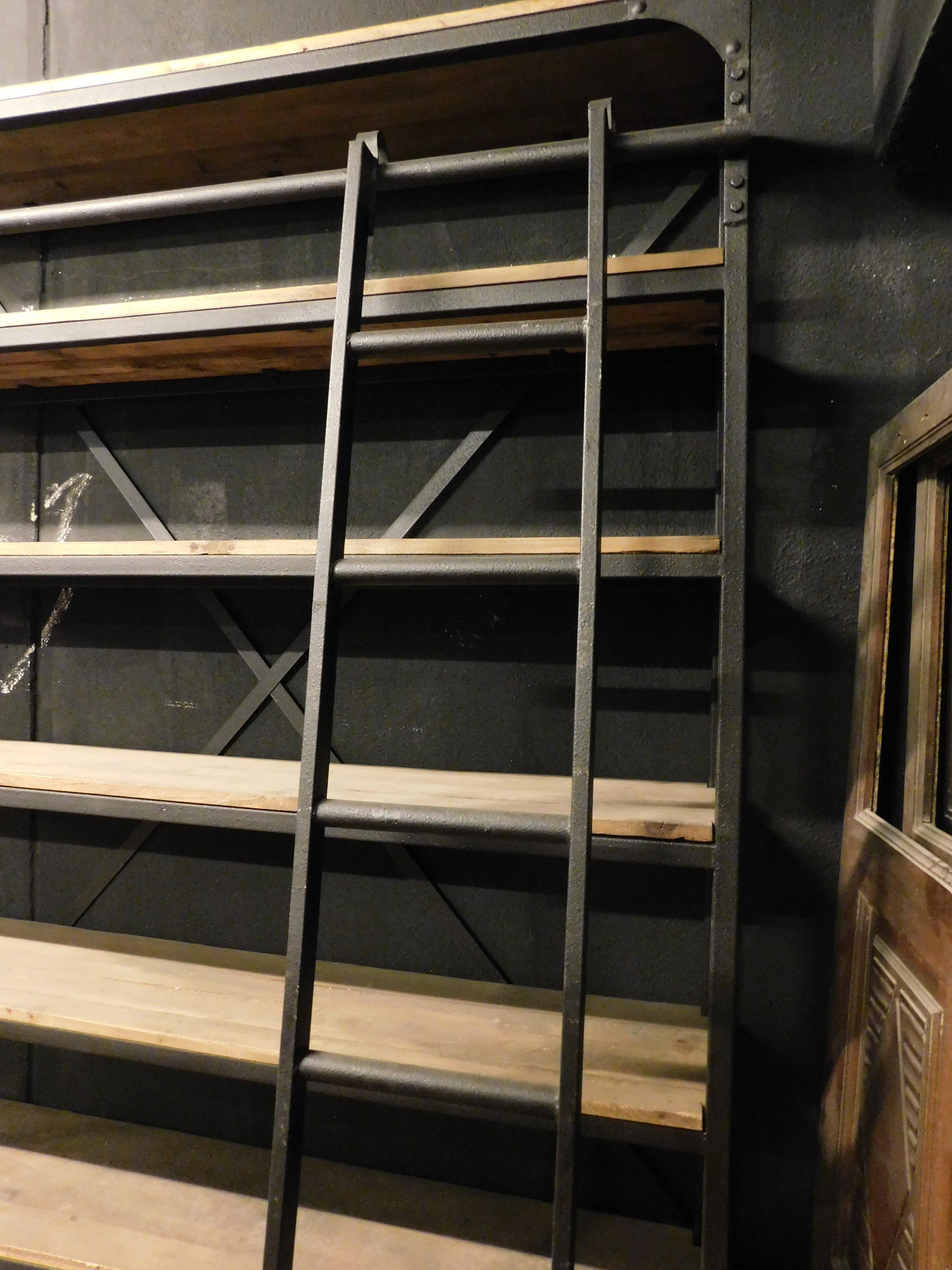 Industrial iron bookcase with wooden shelves and drawers complete with ladder For Sale 2