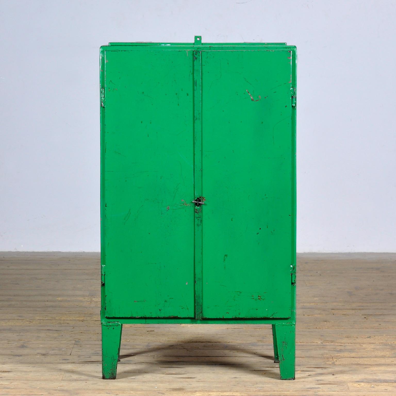 Iron industrial sideboard from the 1960’s with a valve on top. One shelve and two drawers on the inside. Treated for rust and finished with a transparant varnish. The surface is smooth and clean.