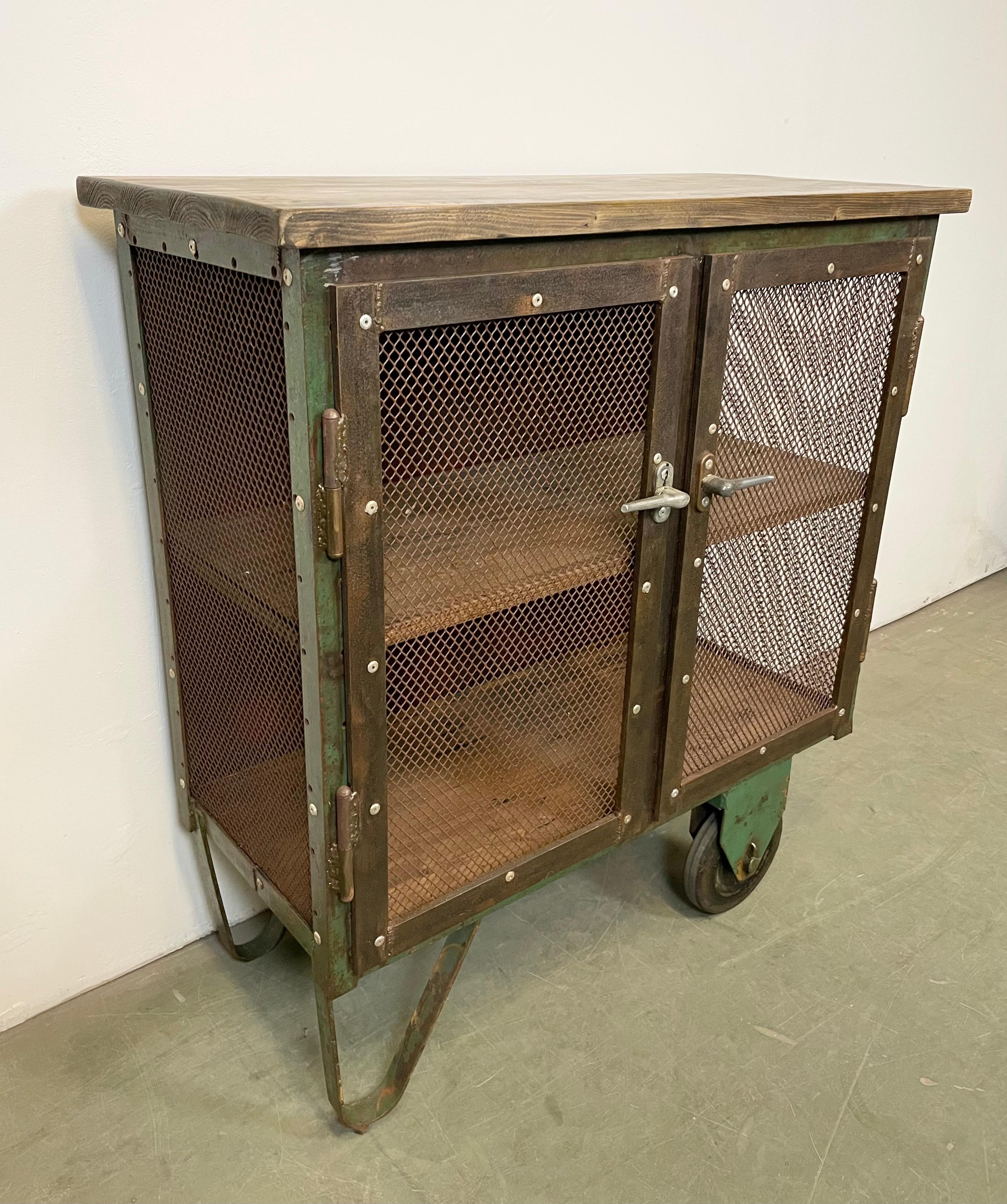 20th Century Industrial Iron Cabinet with Mesh Doors on Wheels, 1960s