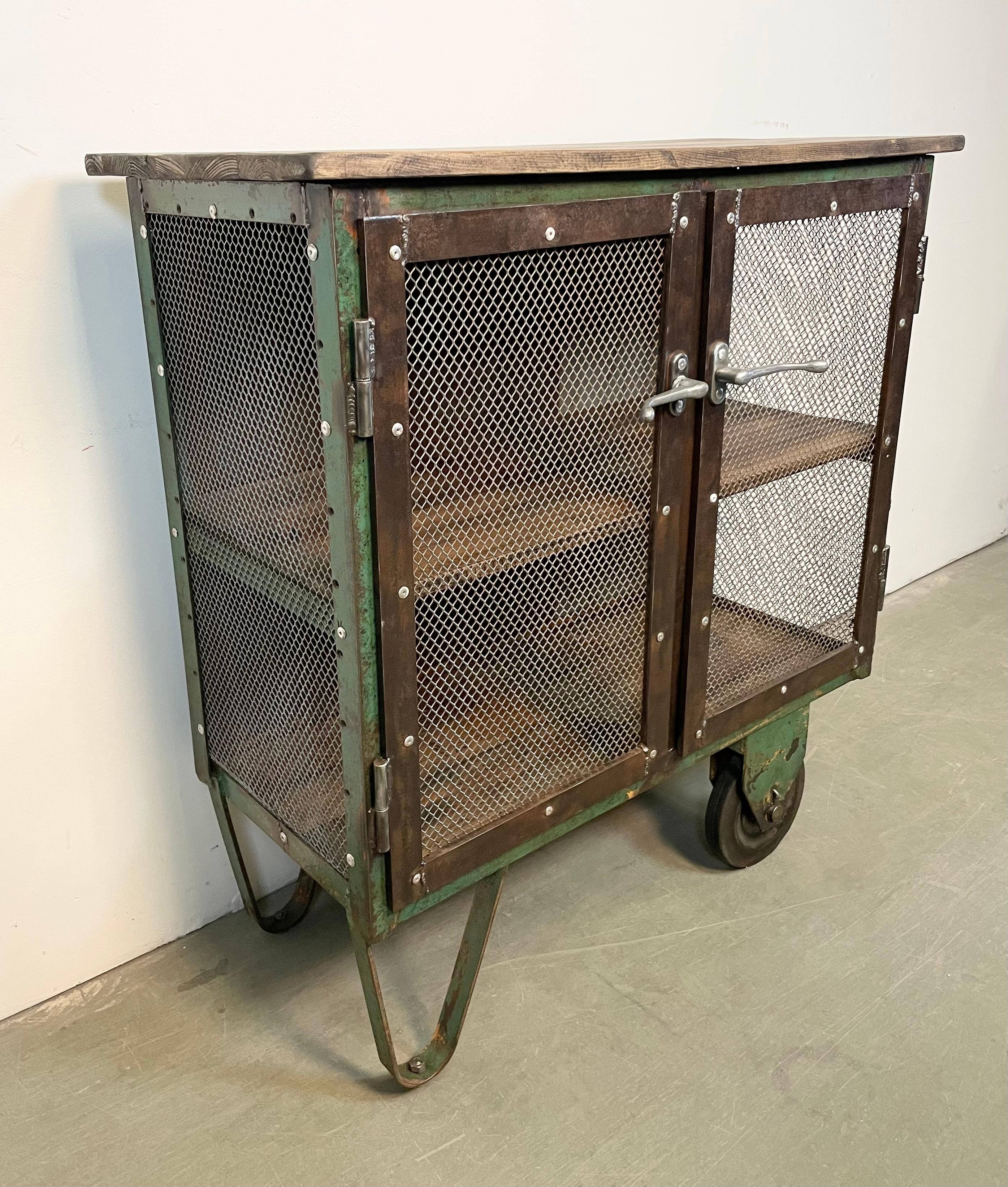 Industrial Iron Cabinet with Mesh Doors on Wheels, 1960s In Good Condition For Sale In Kojetice, CZ