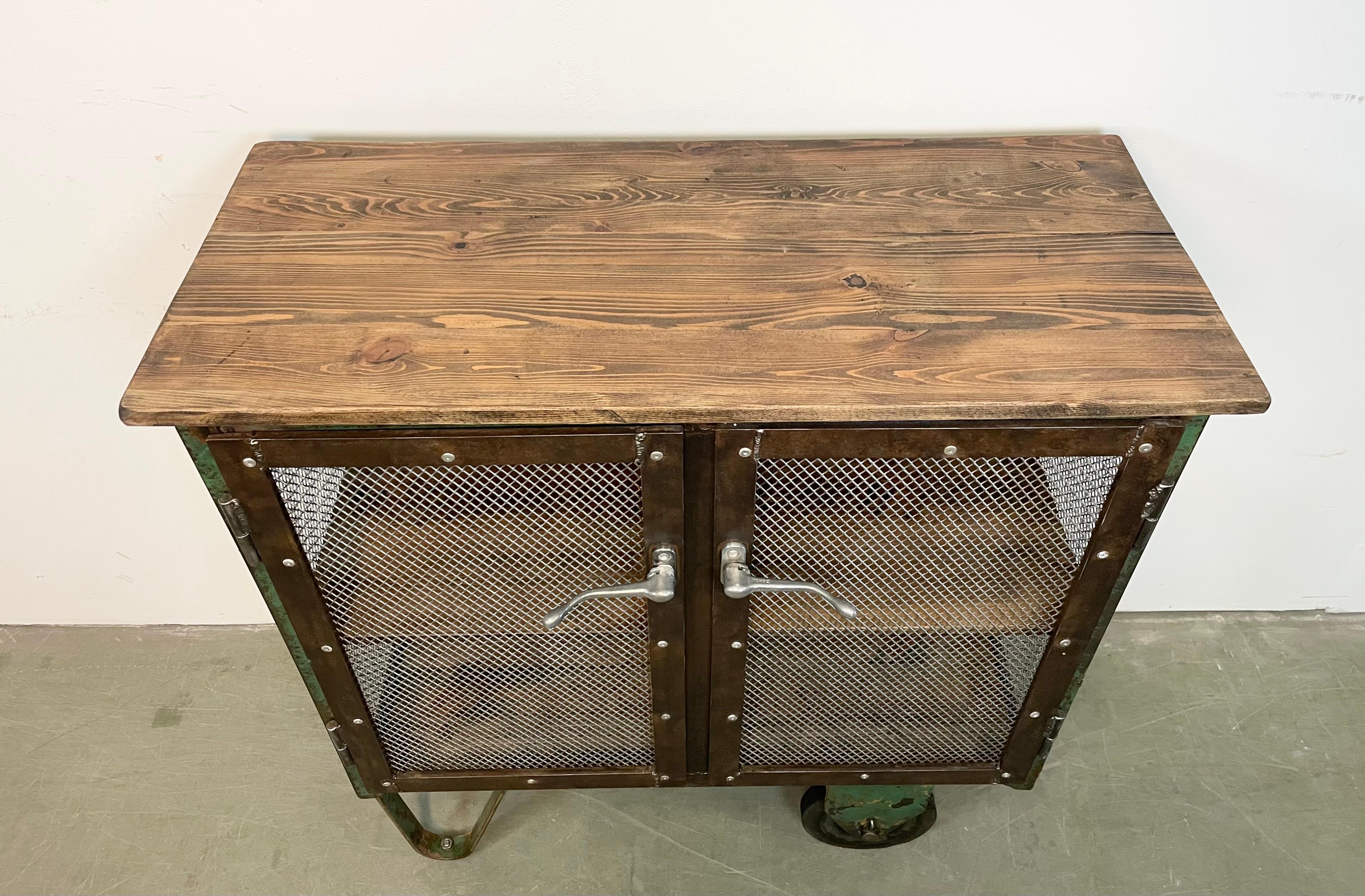 20th Century Industrial Iron Cabinet with Mesh Doors on Wheels, 1960s For Sale