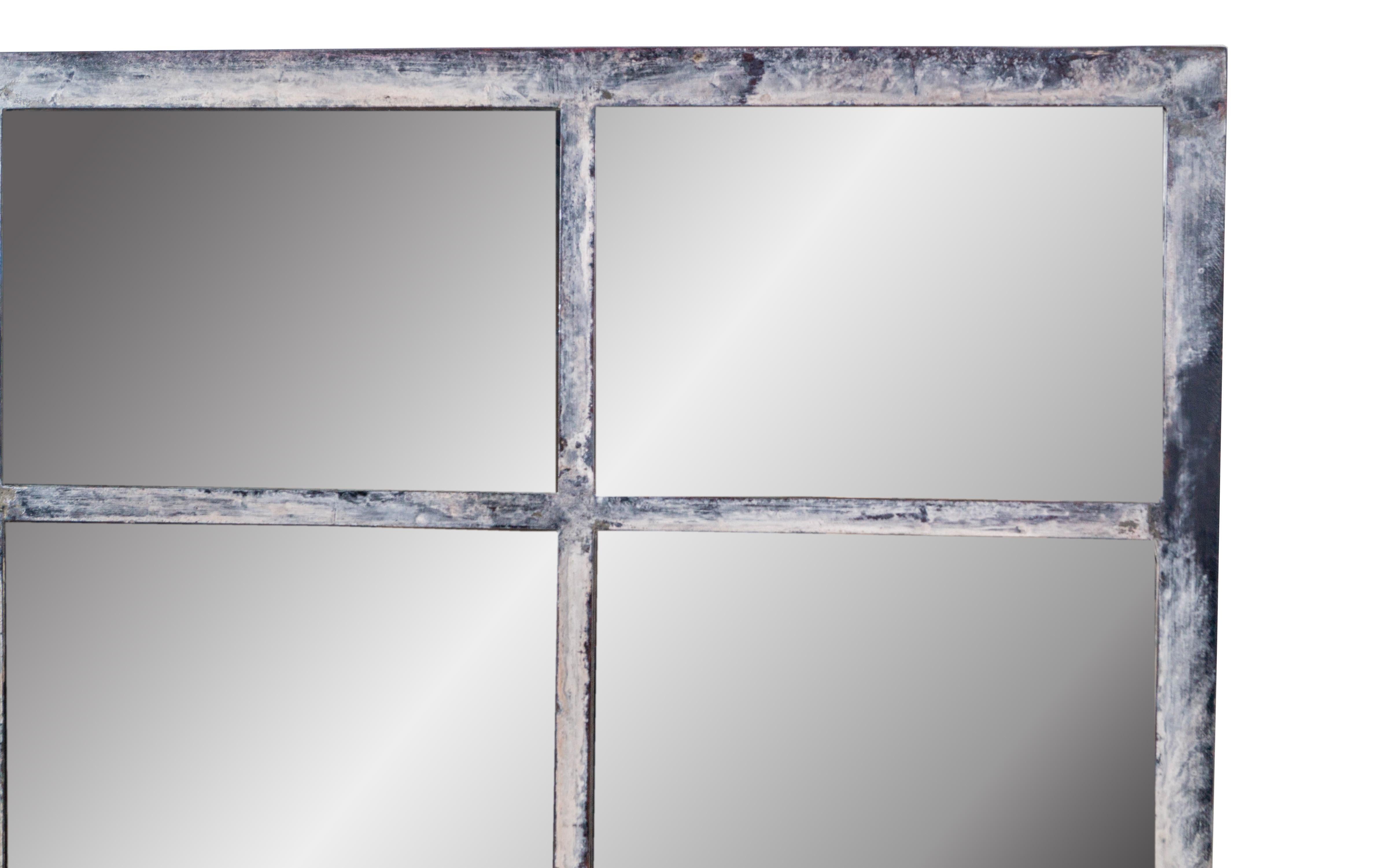 In a century of changing styles, this vintage French window framed mirror is still one of the most popular and versatile pieces of furniture in any room. The Rustic Art Mirror is handcrafted with a rich, distressed-look, patina on antique French