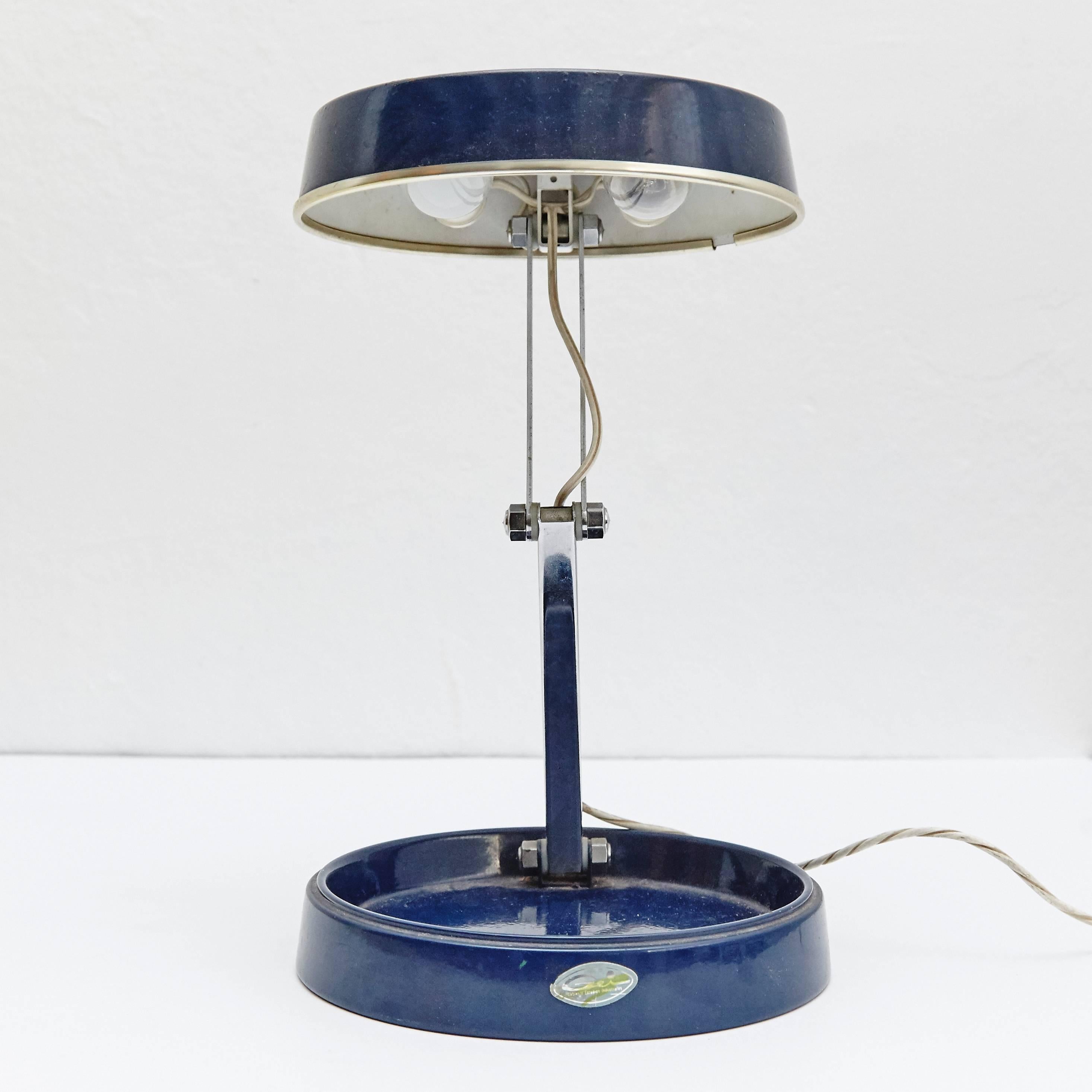 Industrial lamp designed and manufactured by Gei in Spain, circa 1970.

In good original condition, with minor wear consistent with age and use, preserving a beautiful patina.
 