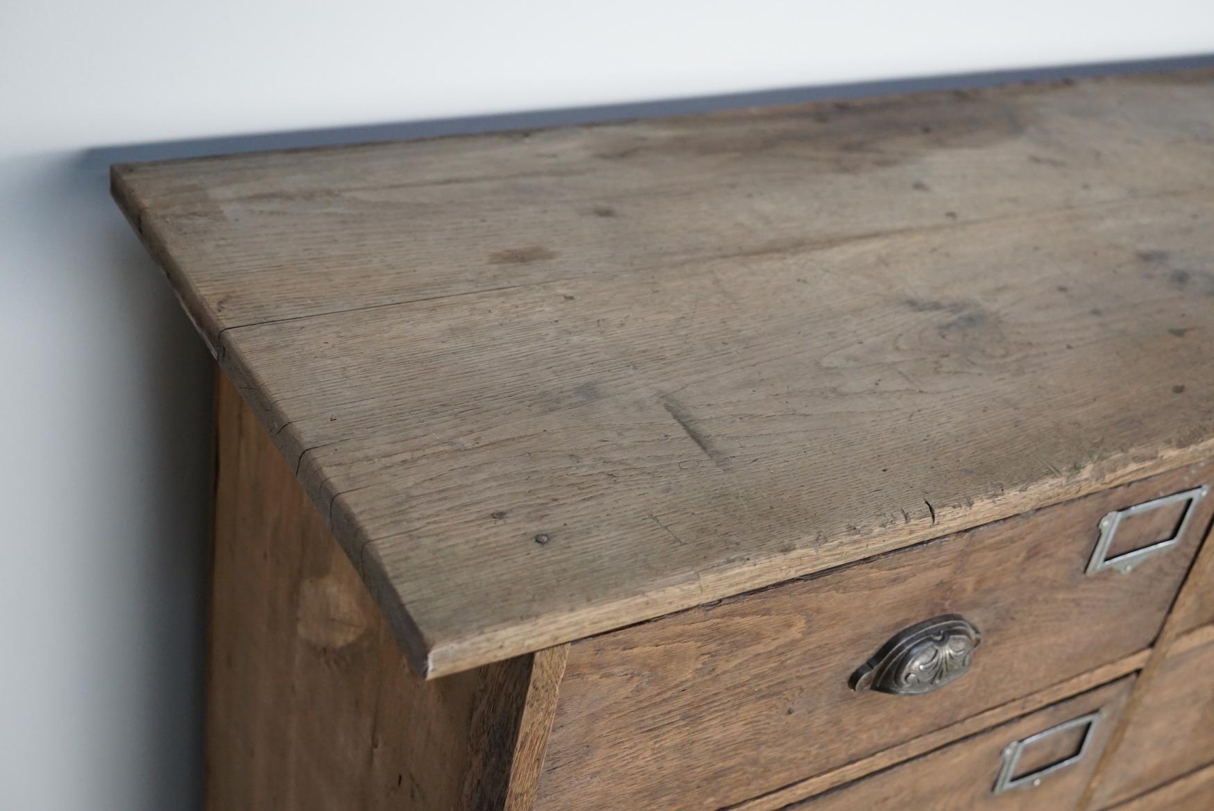 Mid-20th Century Industrial Large French Oak Hardware Store Apothecary Cabinet, 1920/1930s