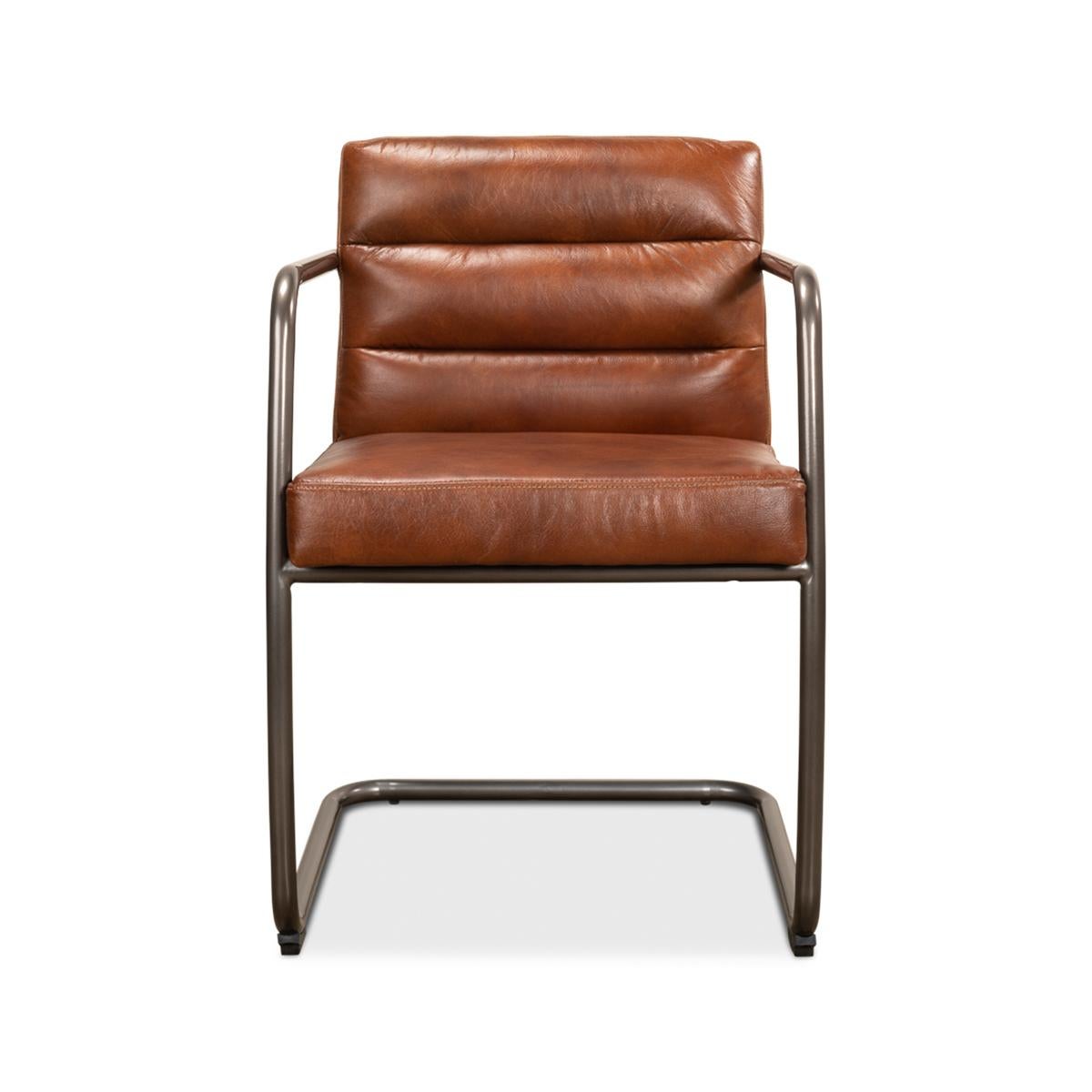 Industrial leather armchair with metal frame and channeled brown leather cushion seat and backrest. Made with pure aniline top-grade leather. 

Dimensions: 21