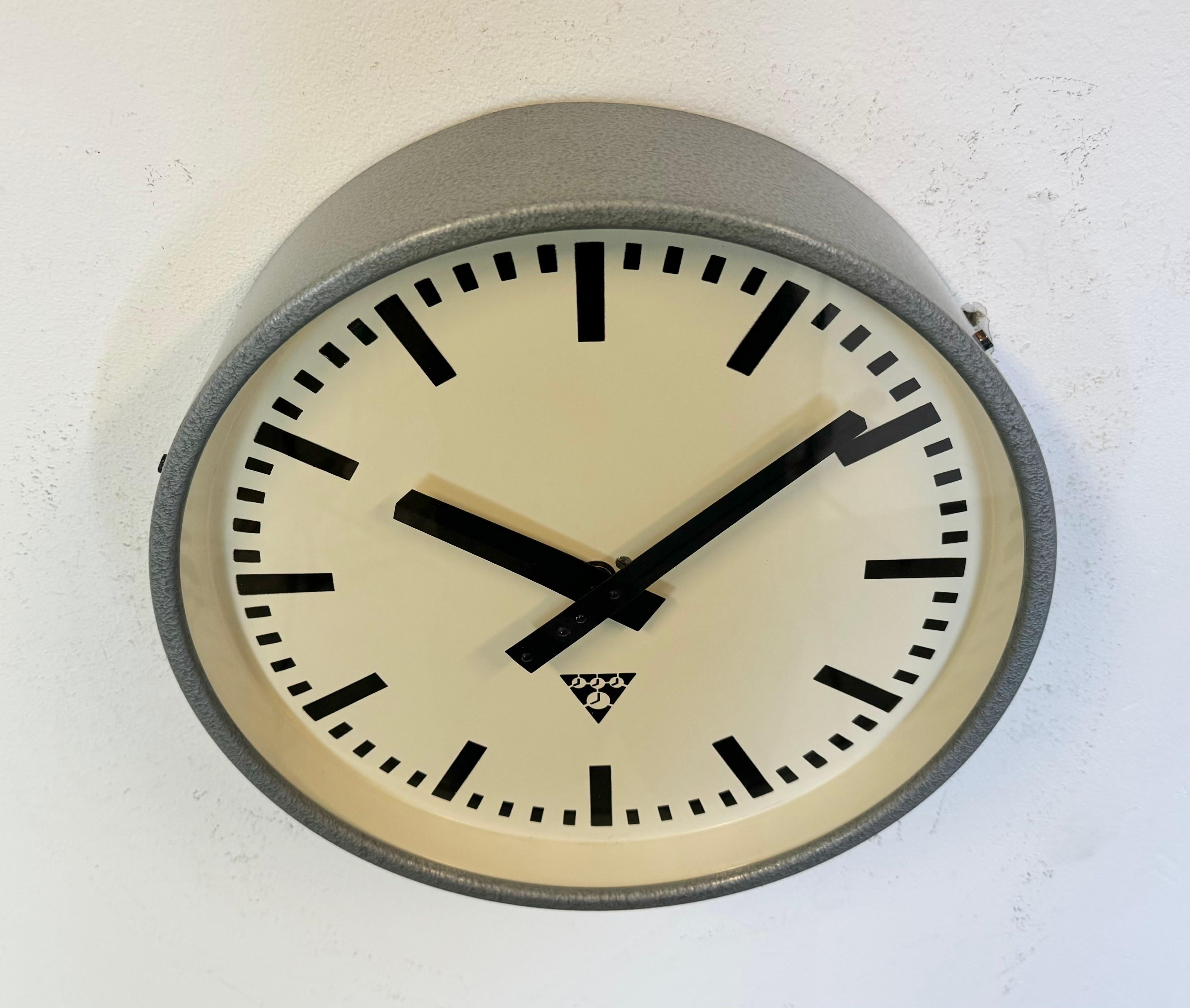 Glass Industrial Grey Hammer Paint Factory Wall Clock from Pragotron, 1960s For Sale