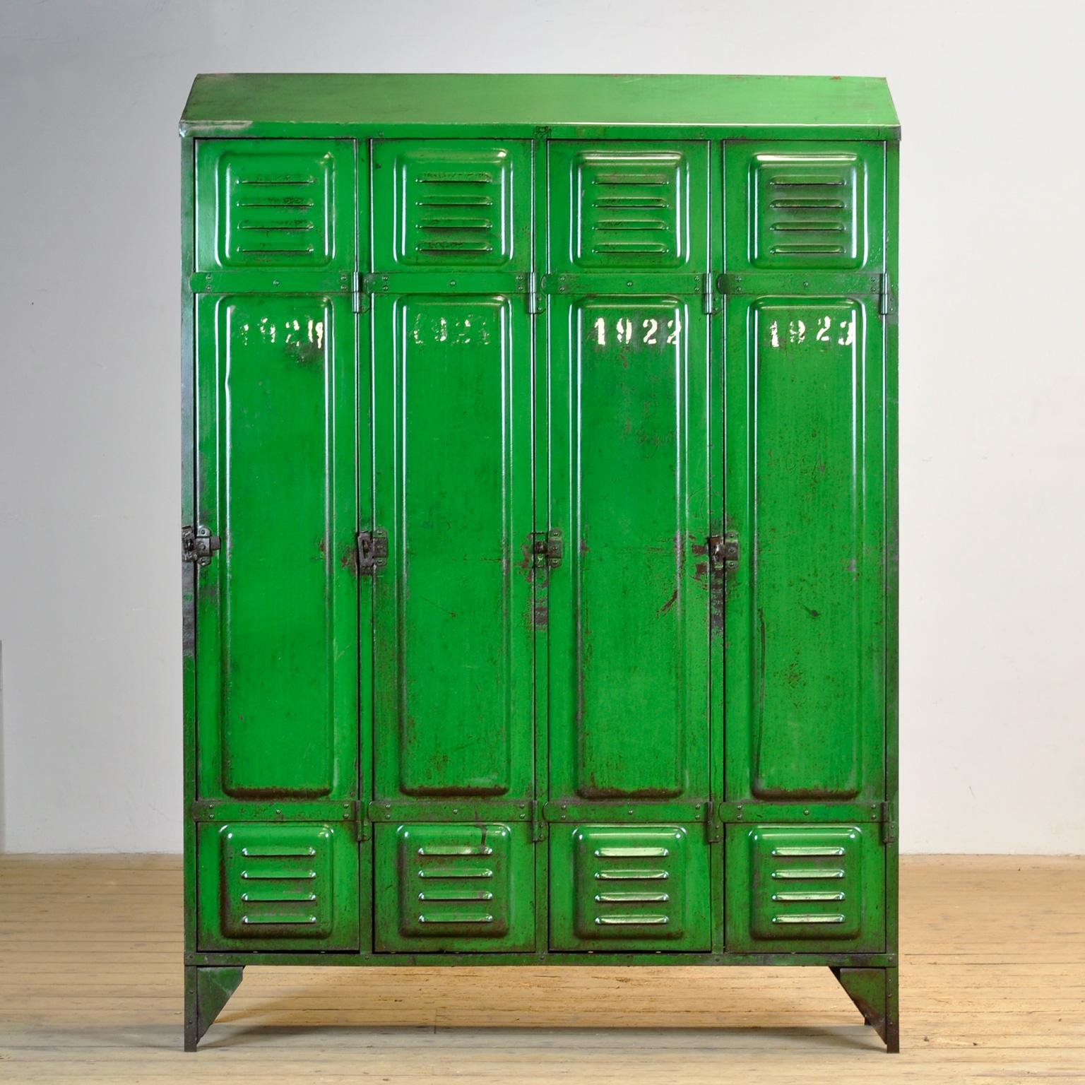 This locker was made in France around 1950 and has four compartments to store all your belongings. In the upper part a shelf and in the lower part clothes hooks. The locker has a green color that fits with any style. The locker has a rustic and