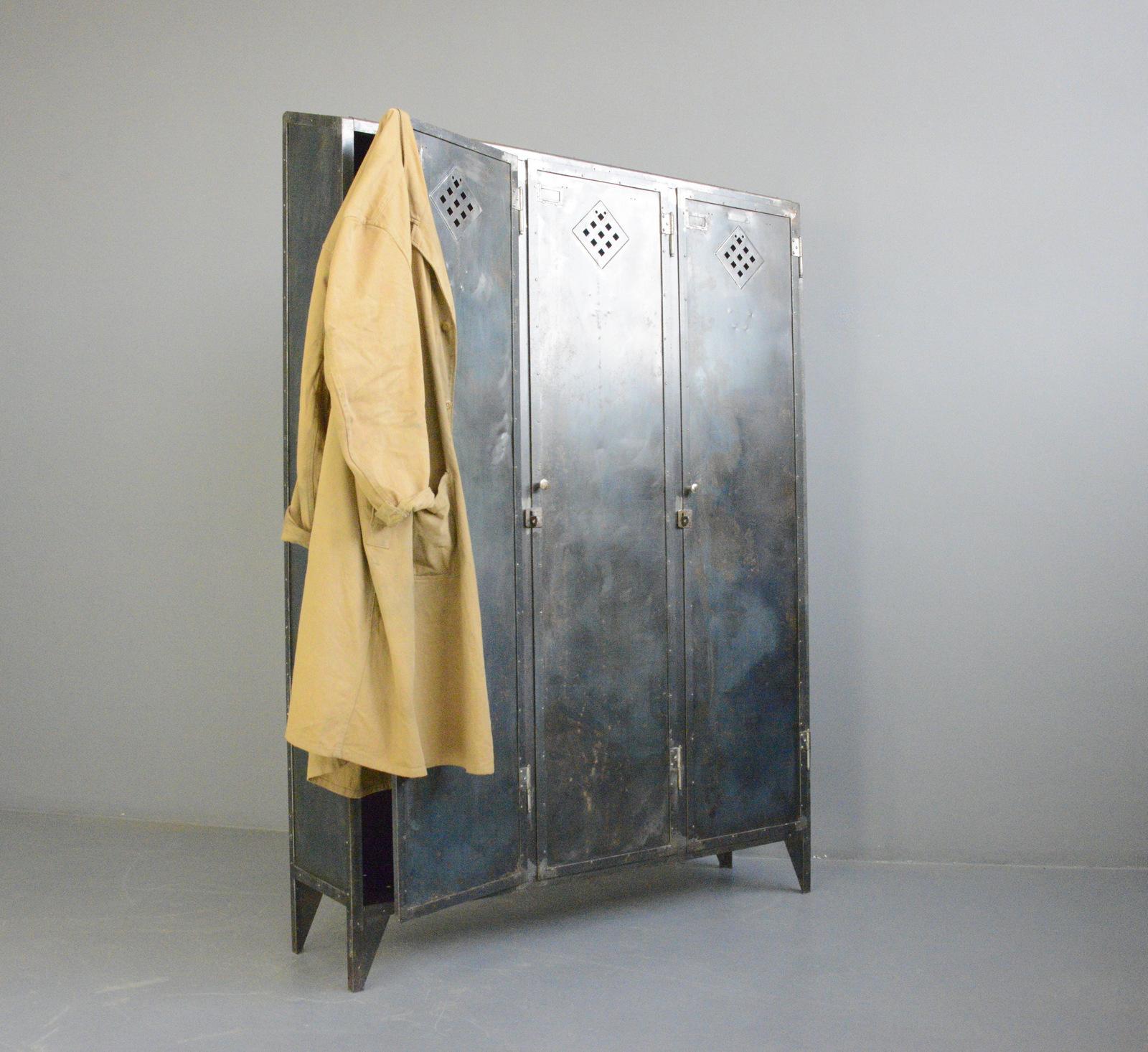 Industrial Lockers By Hulftegger & Co Zurich Circa 1920s

- Riveted sheet steel
- Diamond vents
- Hanging space and a shelf in each compartment
- Made by Hulftegger & Co Zurich
- Swiss ~ 1920s
- 122cm wide x 34cm deep x 180cm