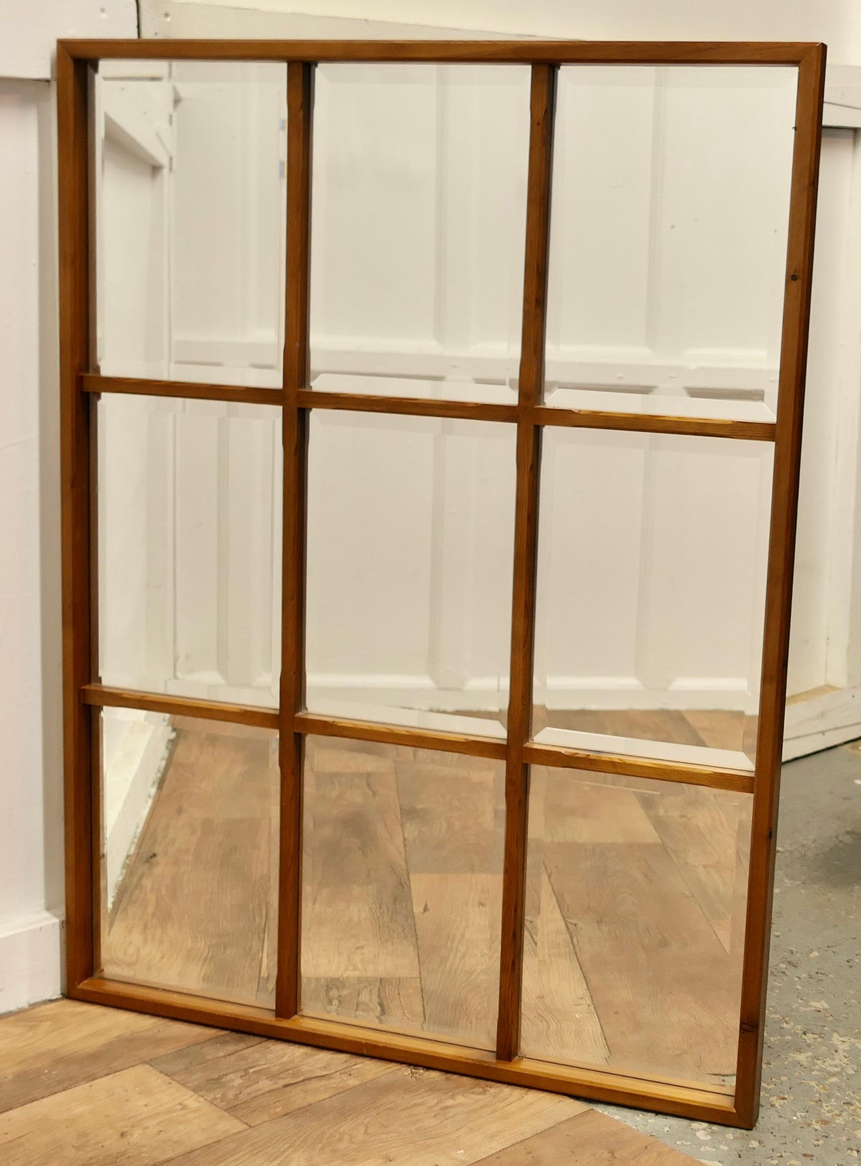 Industrial Look Square Window Mirror 

This large Pitch Pine Frame is set with 9 smaller rectangular framed mirrors, the mirrors all have bevelled edges and the mirrors gives the illusion of looking through a window 

A very attractive piece in good