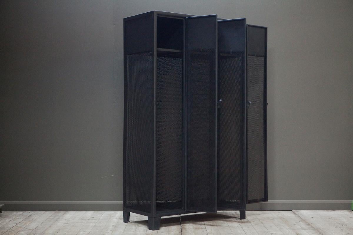 Unusual industrial, vintage metal locker with three mesh doors. 

Restored, finished and sealed.

Each compartment features an original shelf and can be customised with a hanging rail. 

