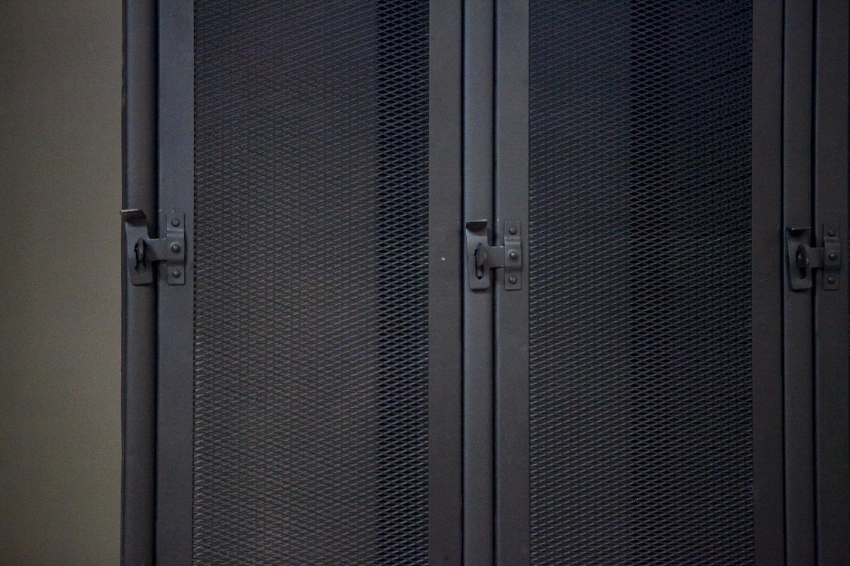20th Century Industrial Metal Black Three Door Locker For Sale