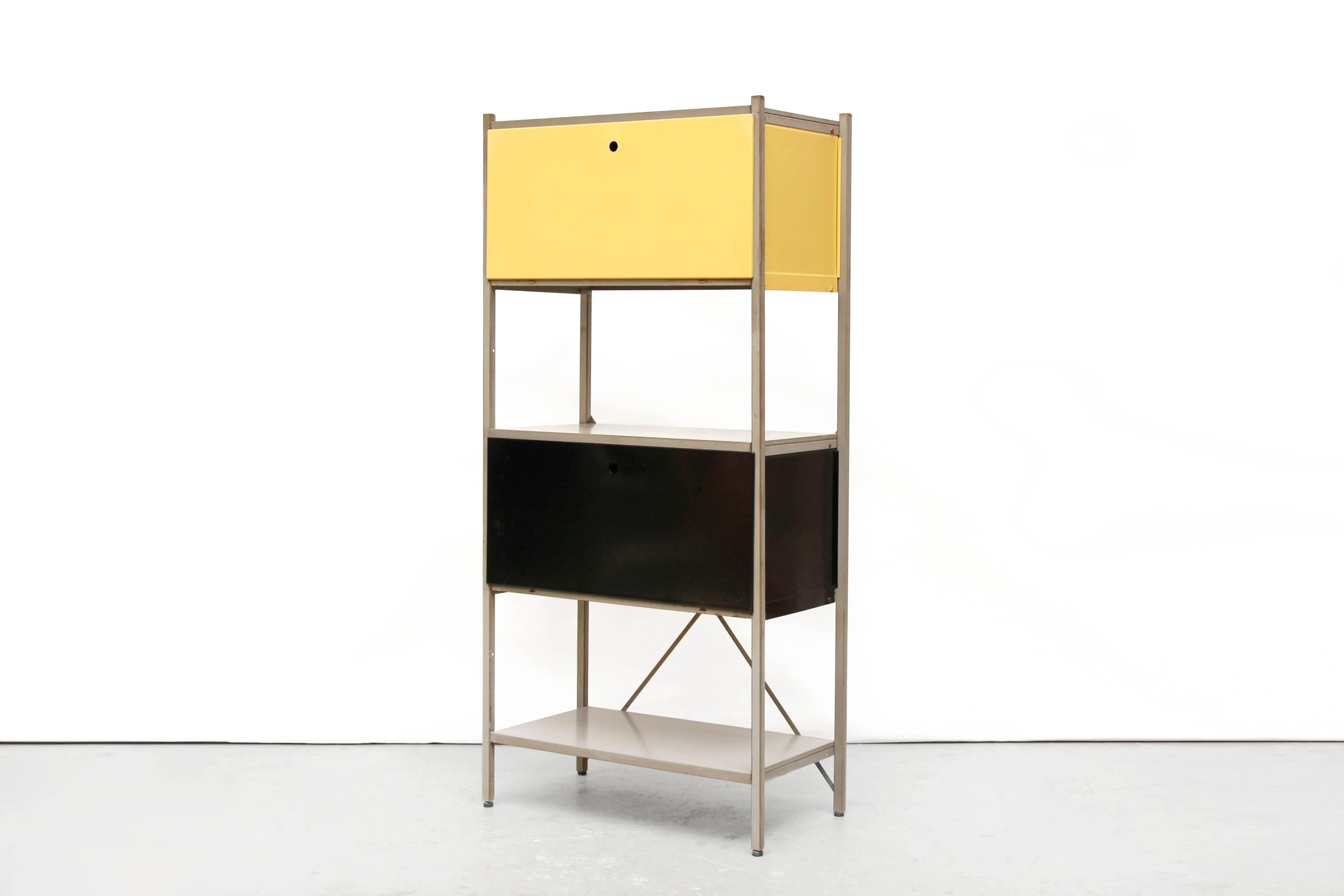 Impressive industrial metal cabinet model no. 663, wall unit or room divider designed by Wim Rietveld (1924-1985) son of Gerrit Rietveld, for Gispen Culemborg in 1954. 
A very nice modular wall unit that can be built by your own taste and needs.