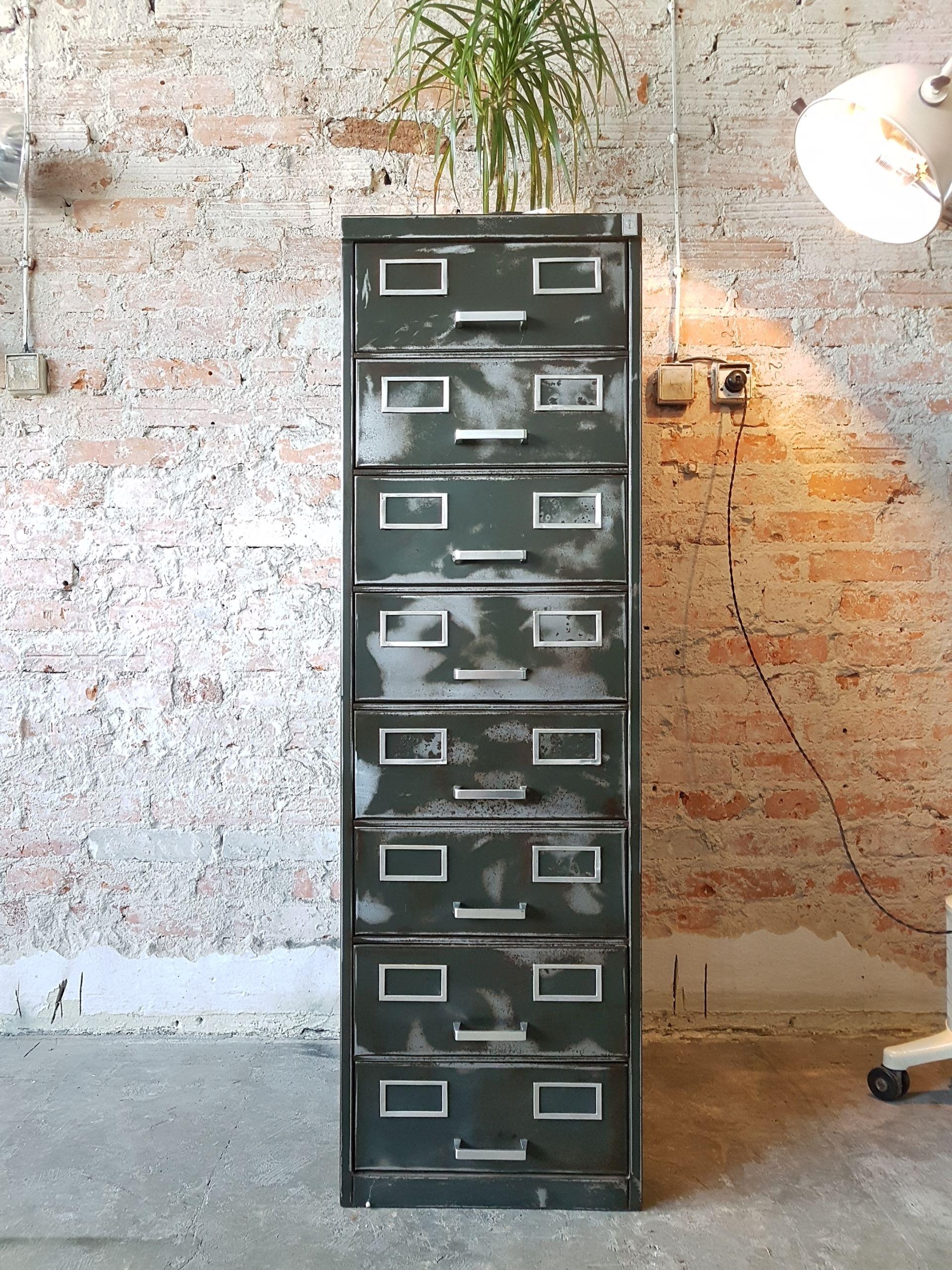 This wonderful file cabinet has been customized in Mag Haus workshop with a stripped, polished, raw steel patina sealed with a gloss lacquer finish. The original green and polished metal is beautifully complimented by the polished original aluminium