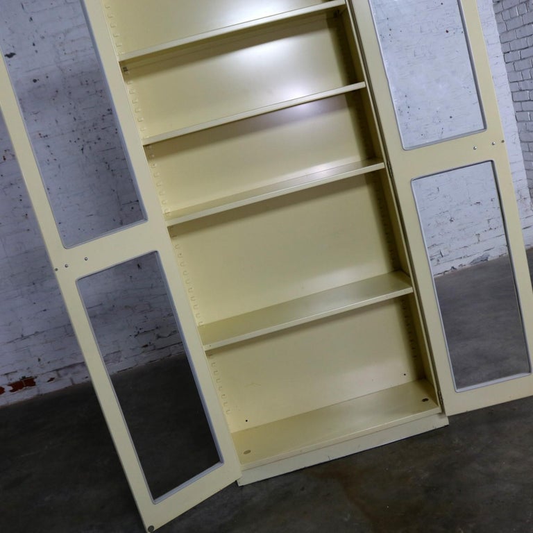 Industrial Metal Display or Bookcase with Glass Doors at 1stDibs