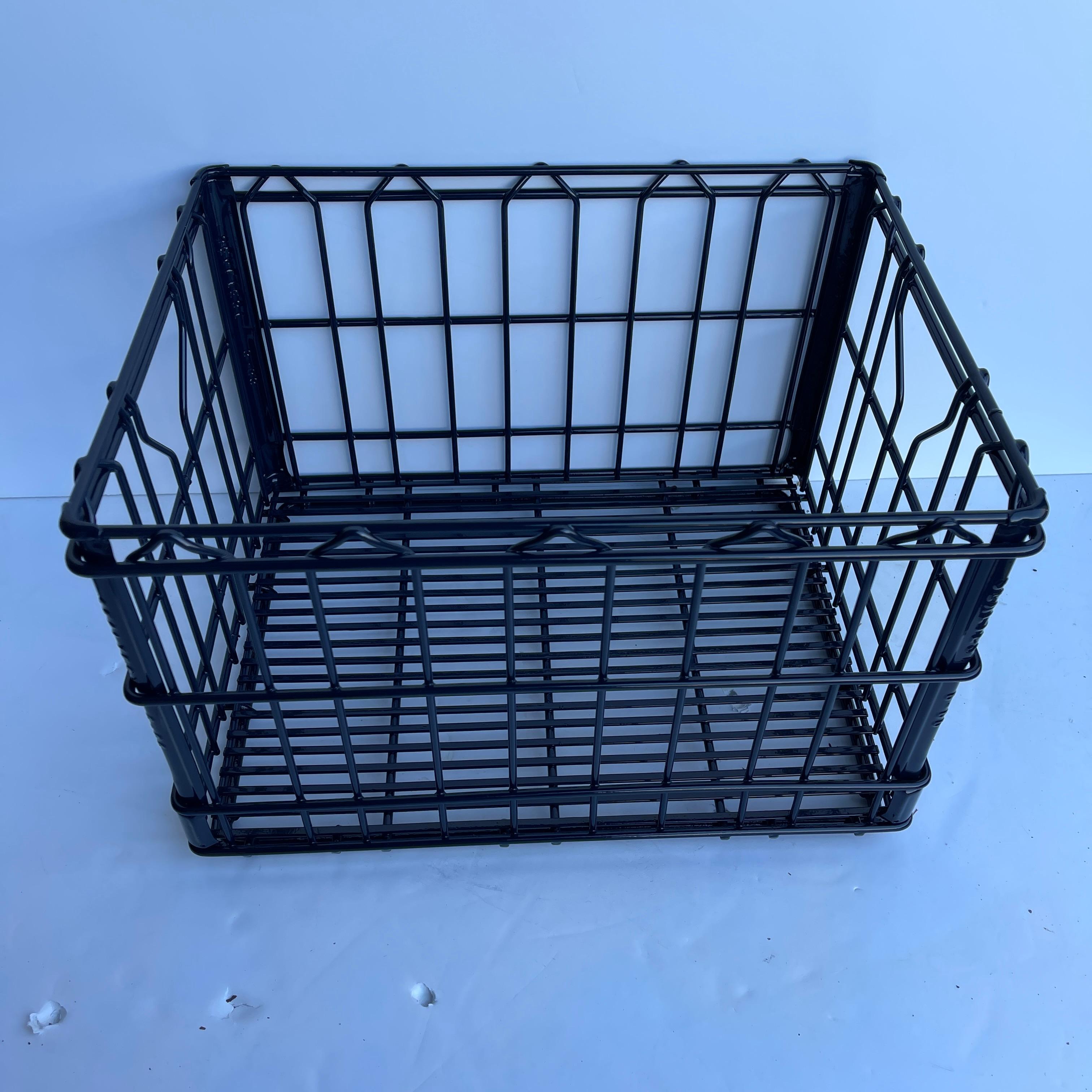 1960s Industrial Metal milk crate. Freshly powder coated, the milk crate is sturdy and sleek in classic navy blue. A perfect addition to any room that needs storage; for records, shoes or collectibles, the milk crate will hold your collectibles in