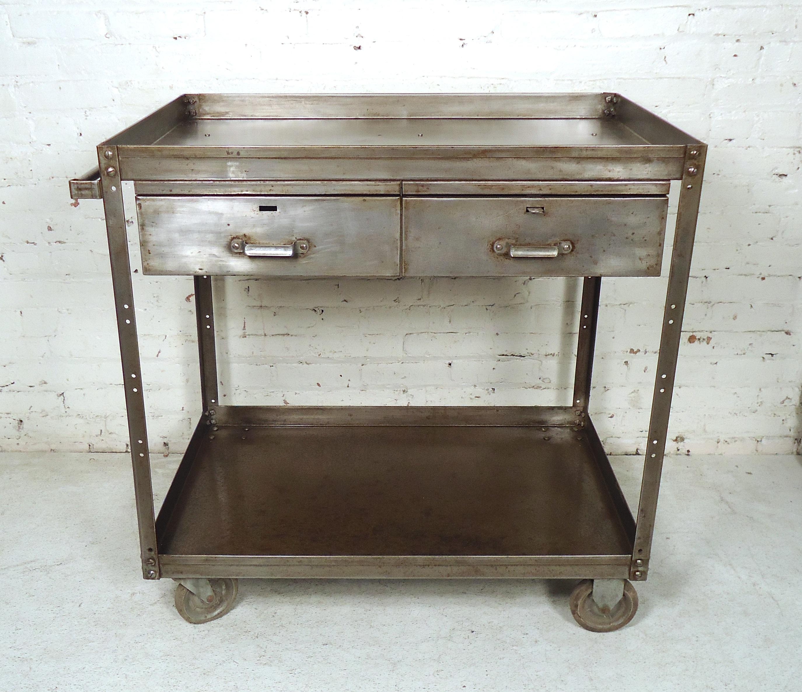 Great industrial two tier metal cart on wheels featured with two drawers.
(Please confirm item location NY or NJ with dealer.)