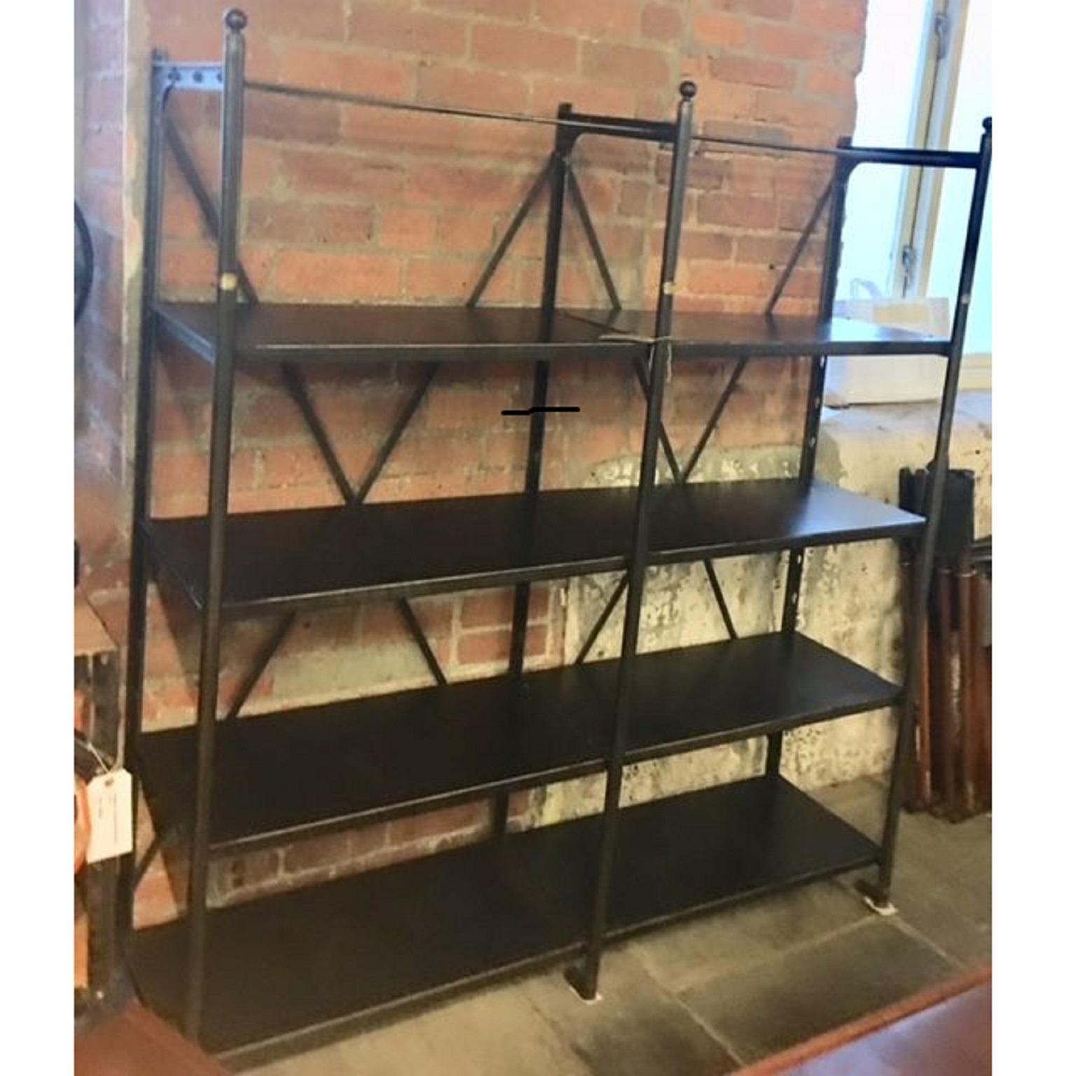 Industrial Shelving Unit made by Theodore Scherf, Paris. Would have once
been used in a textile factory. Steel Structure with capitals and feet. Brass 
plates that read: ‘T H SCHERF, 35 RUE D’ABOUKIR, PARIS’ 

Please note the shelves are not