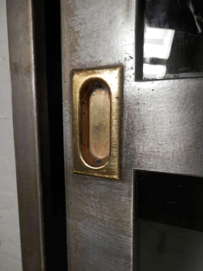 industrial metal cabinet with glass doors