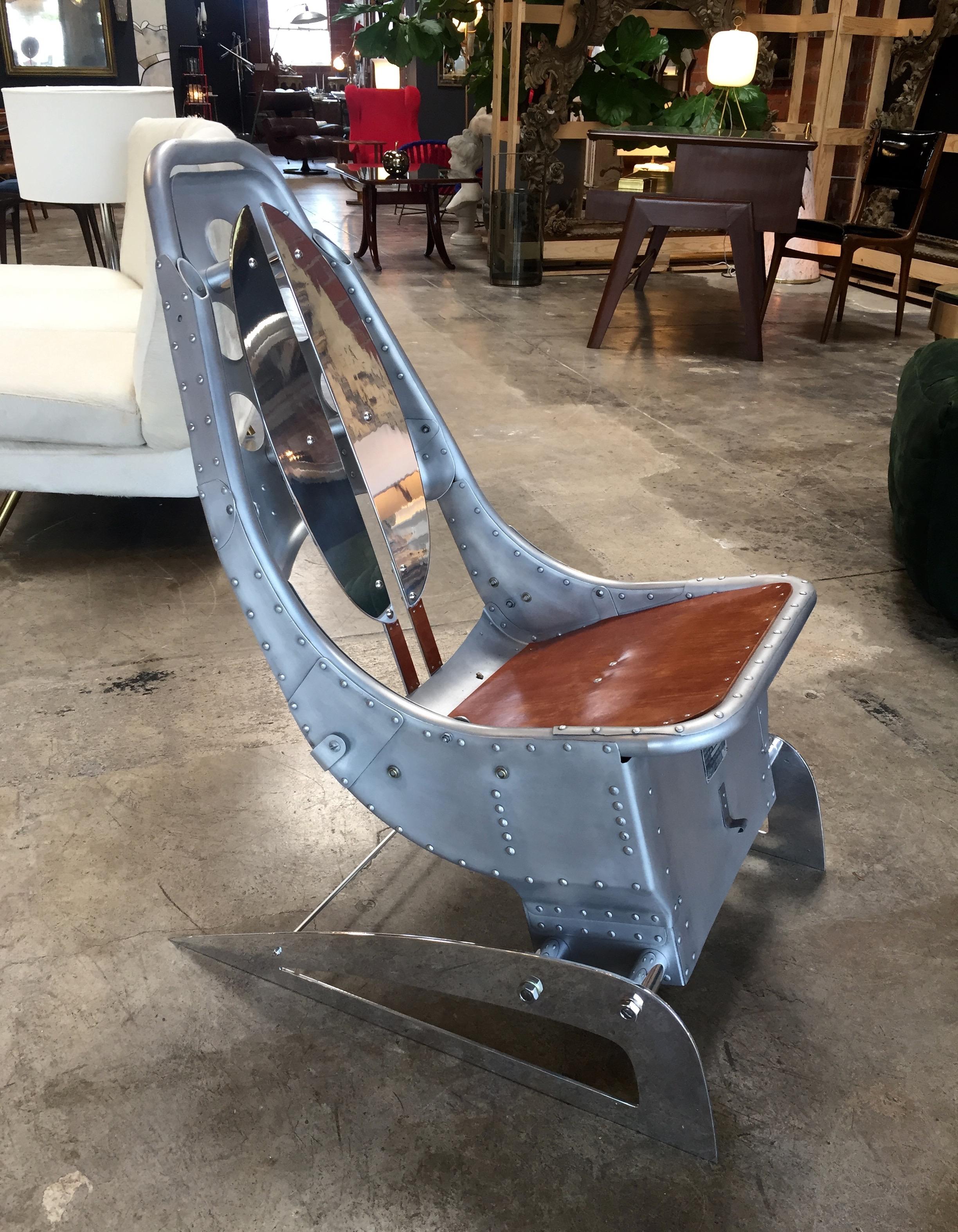 For your consideration a vintage aluminum airplane chair. Seat in wood.
Original vintage condition. Patina, scuffs, and scratches present.
