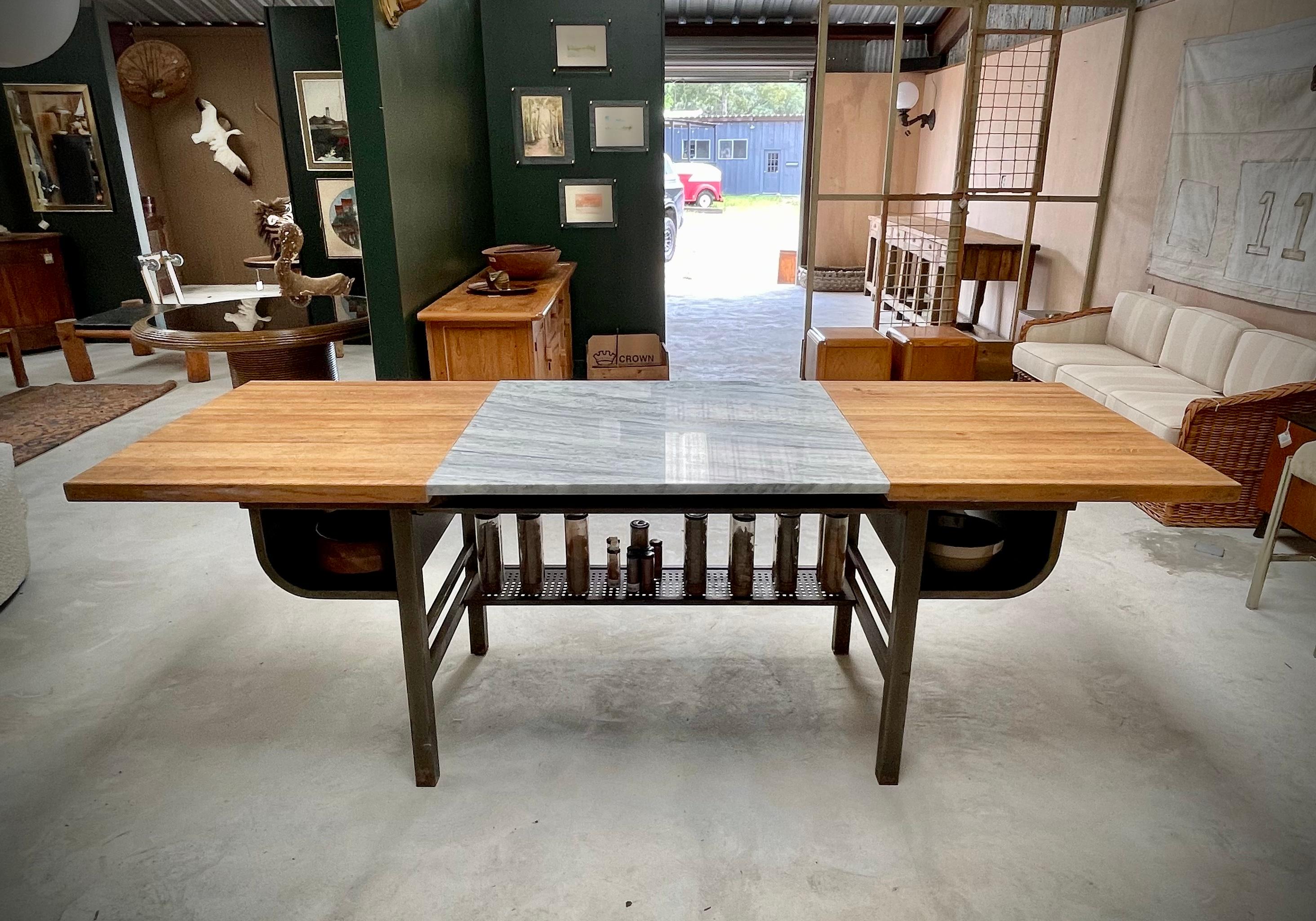 When a vision comes together well, it is always exciting. Combining the durability of old weather oak butcher block with the sophistication of marble, creates a versatile surface ideal for functionality whether you use it as a creative work table or