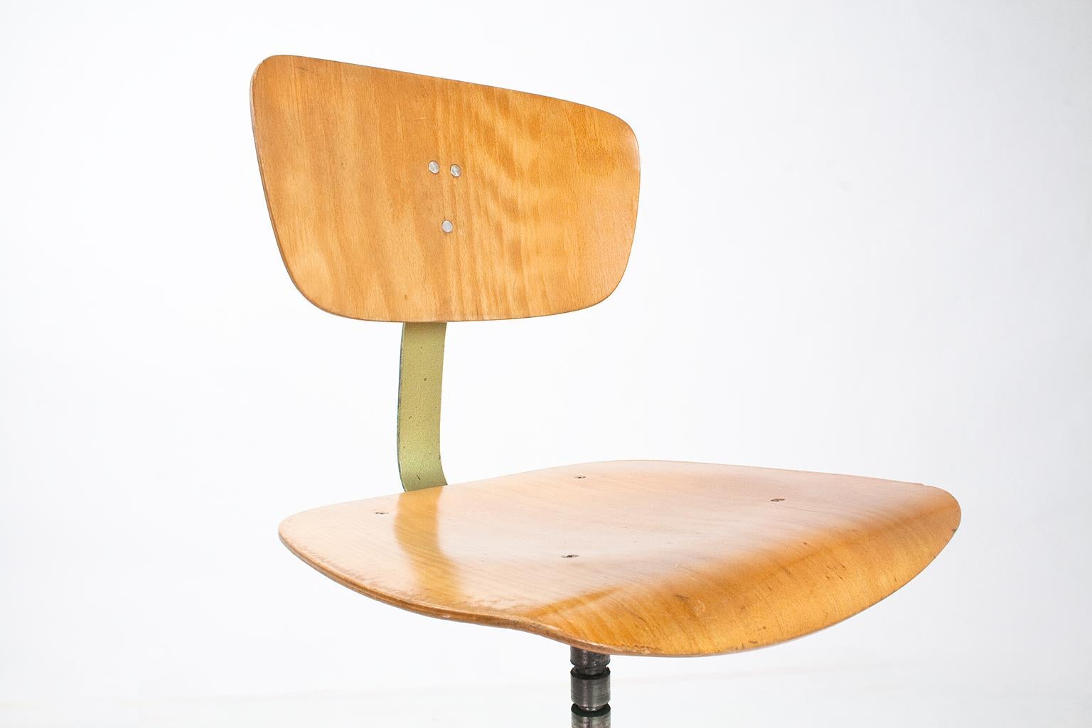 Industrial mid century Swivel Stools or desk chairs in plywood, Germany 1960s 2