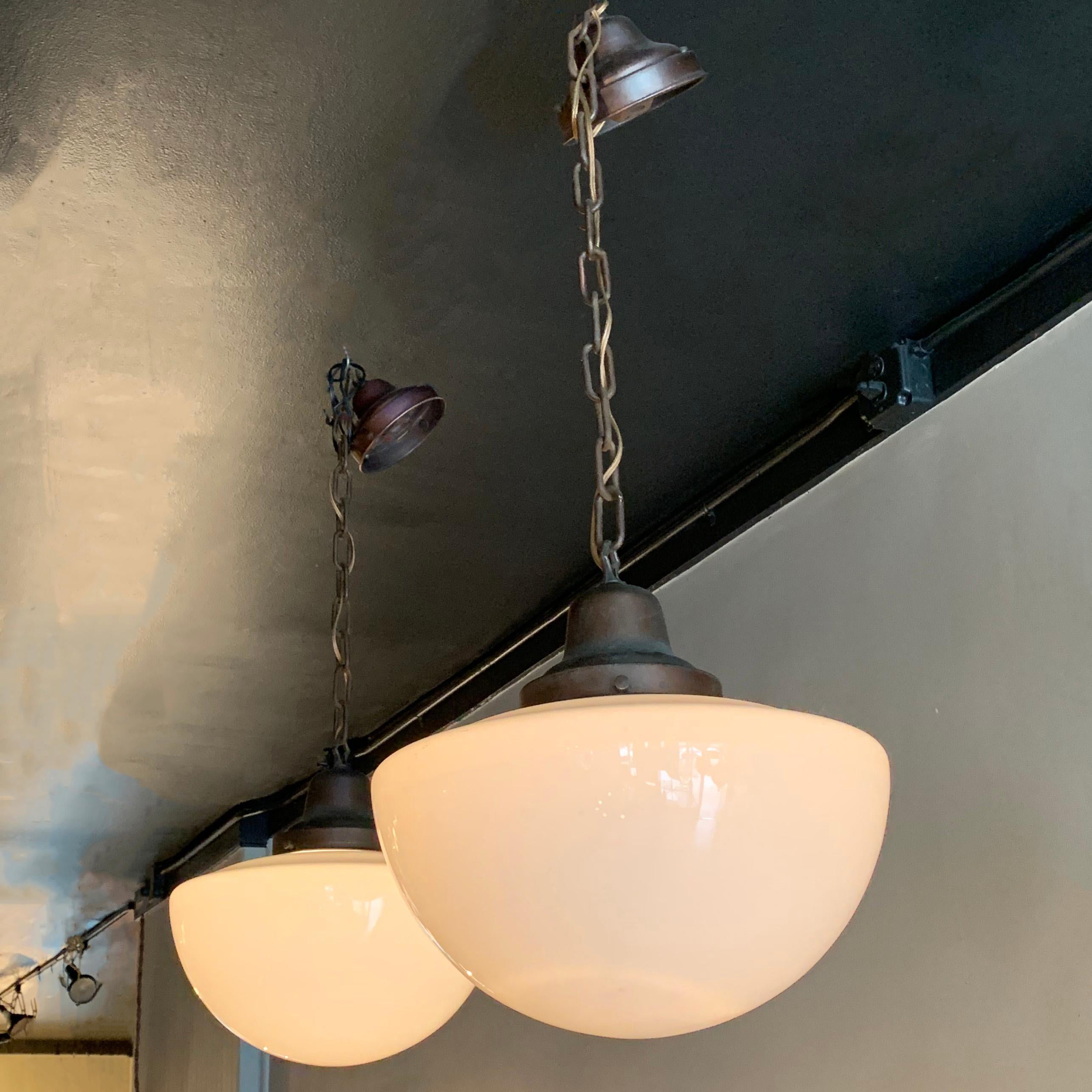 Industrial Milk Glass and Brass Library Pendant Lights In Good Condition In Brooklyn, NY