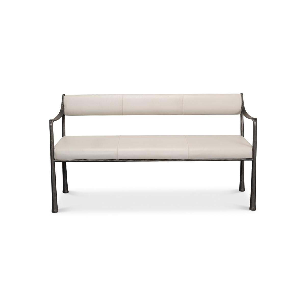 Industrial modern bench with a hand-hammered iron frame in a gunmetal finish with Napa off-white leather cushions. A classic bench with a unique form.

Dimensions: 60