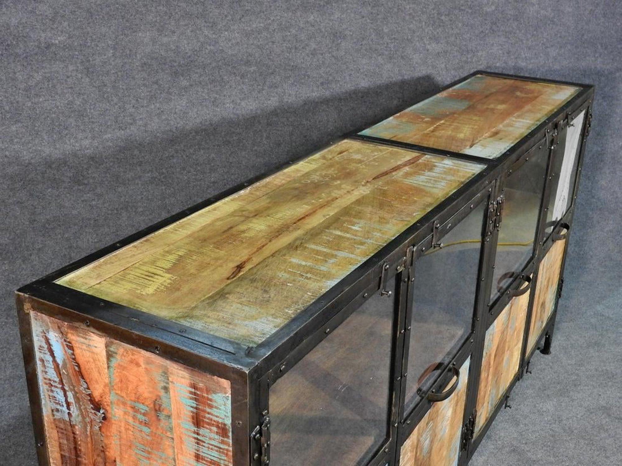 Metal panels. 4 doors containing one shelf in each. Plexiglass inserts.
(Please confirm item location - NY or NJ - with dealer).
 