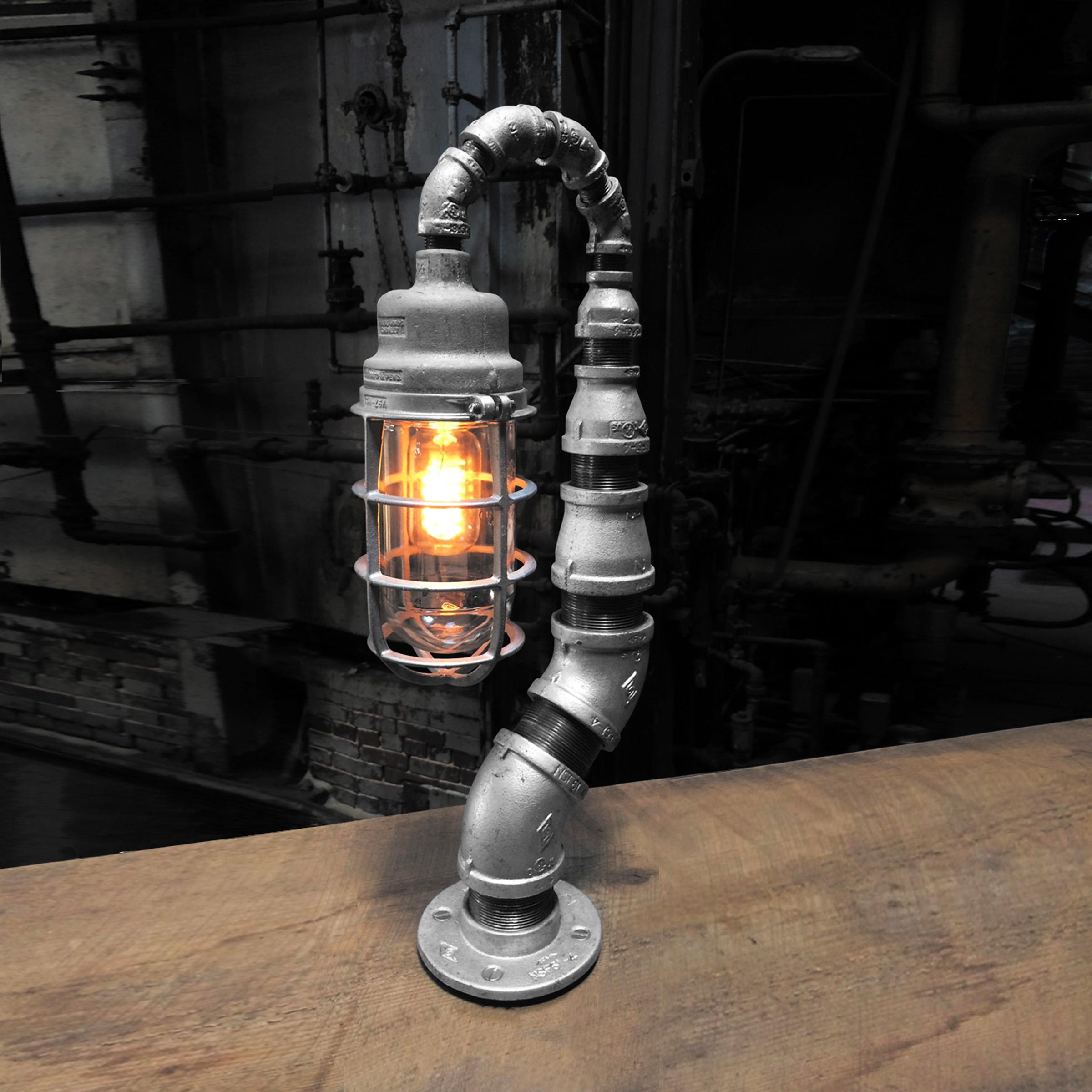Tall and slender with a modest footprint, The Forbidden Fruit industrial table lamp is the perfect addition to your industrial decor and easily turns a lonely bedside table or end table into an intriguing and interesting space.  The antique Crouse