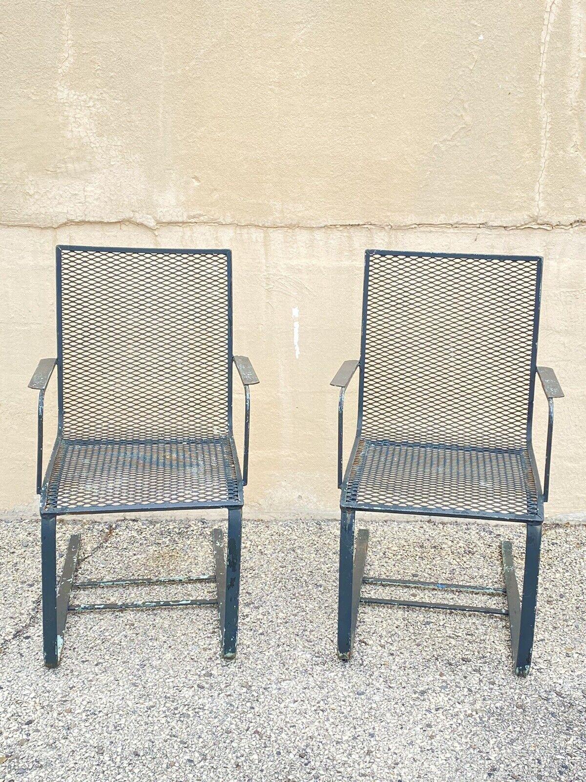 Vintage Industrial Modern Green Heavy Wrought Iron Metal Mesh Cantilever Garden Patio Chairs - a Pair. Circa Mid 20th Century
Measurements: 35.5