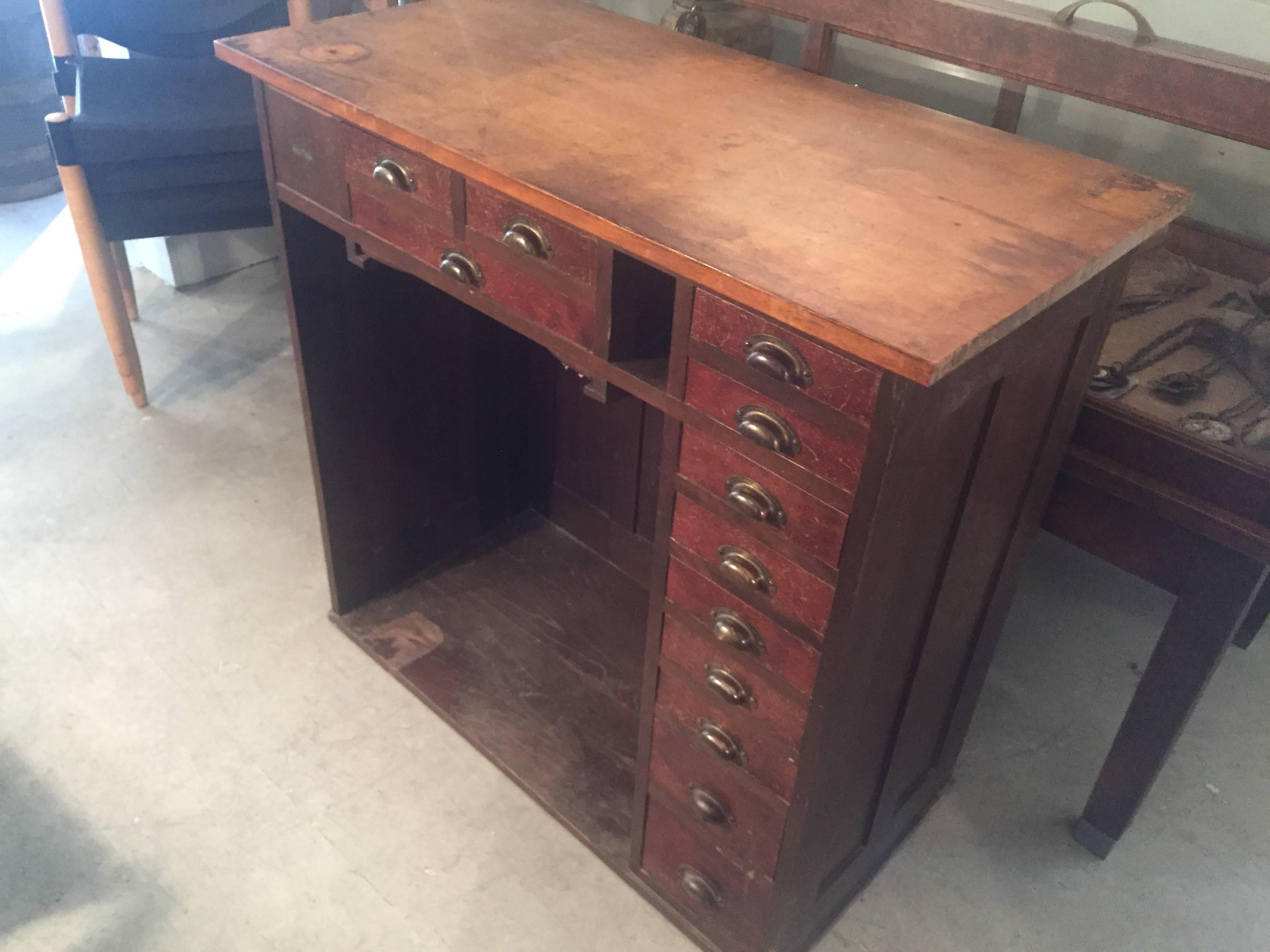 Great, circa 1900 Jewellers work table. Multi drawer cabinet with great patina and nice surface. Can be used for lots of things. Would look great with a period Toledo Stool.