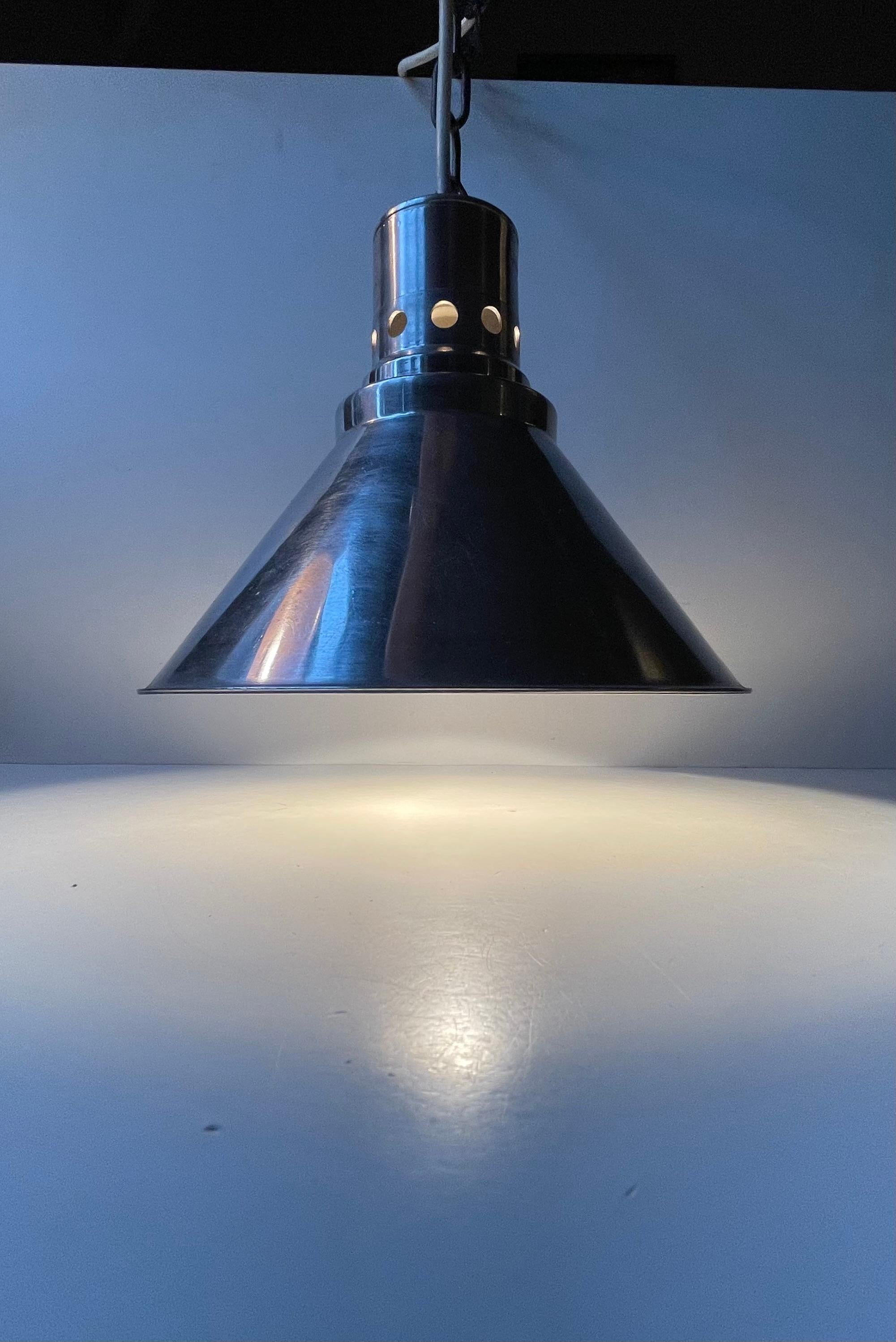 A very rare industrial chain-suspended hanging light made from thick stock aluminum. Suitable for any contemporary, nautical or urban New York style apartment that needs an authentic twist. It was made by Nordisk Solar Compagni (NSC) in Denmark