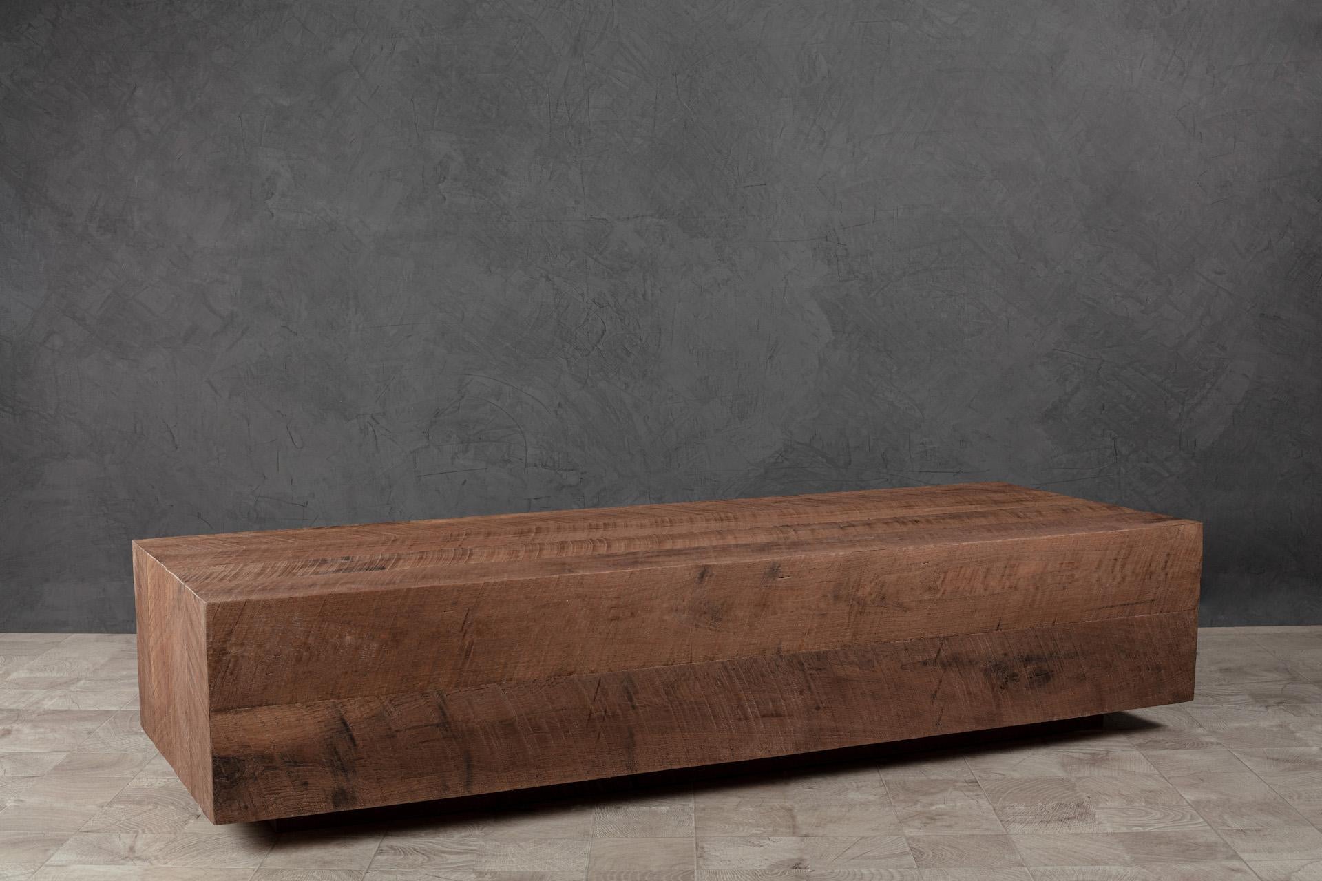 This industrial dense hardwood bench is artisan crafted with meticulous care. It´s texture and geometric shape made with black walnut or red oak have natural variations in grain and hue that bring warmth to the clean, geometric silhouette.
