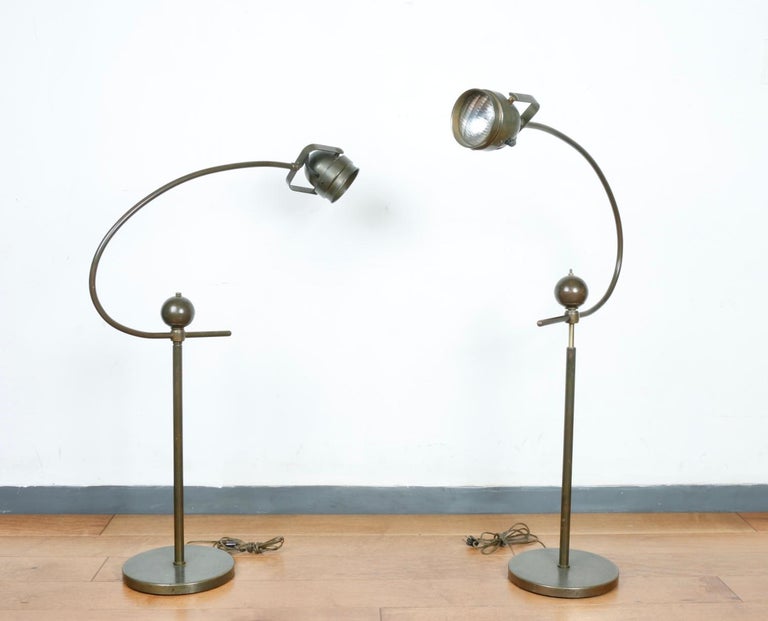 Amazing pair of Industrial floor lamps. Well kept and well made. Nice curved design with working lights. No broken parts. Great vintage pieces.