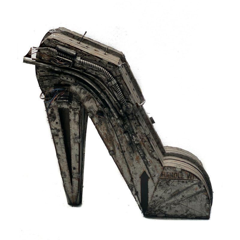 Nick De Angelis (American 20th century) Industrial, papier mâché, and wire high heel sculpture. Artist signed to the underside.

Additional information:
Type: Sculpture 
Subject: Industrial
Material: Paper 
Region of Origin: US
Dimension: 22