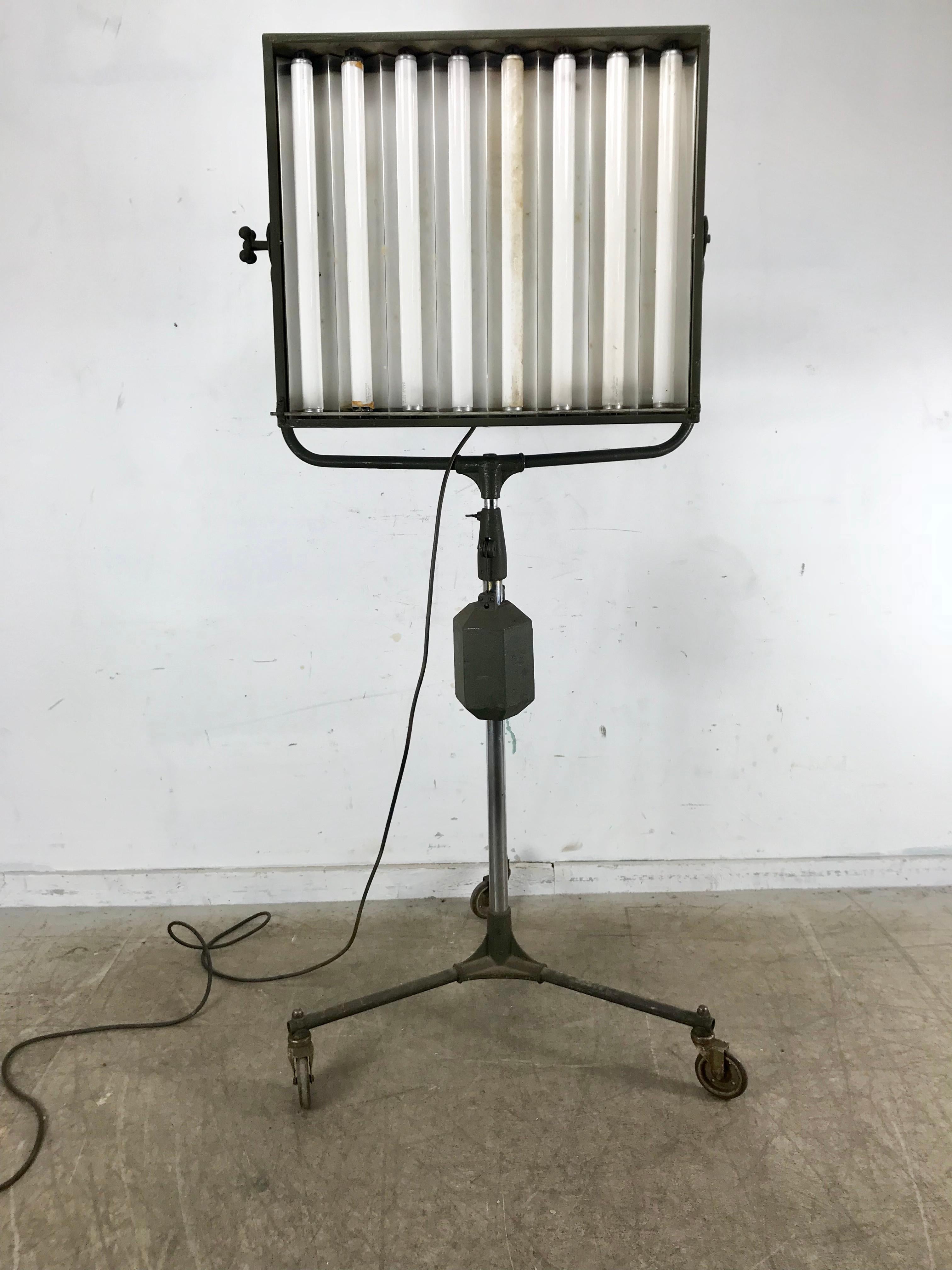 Industrial photo adjustable floor lamp made by Beattie's Hollywood Hi-Light Company, unusual weighted pulley system for height adjustment, height adjustment from 73